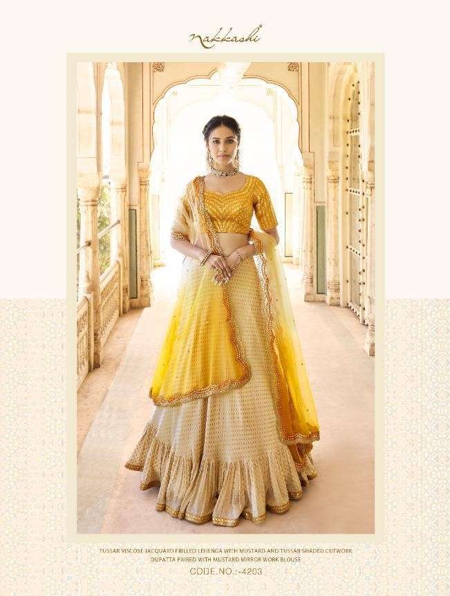 EIRA BY NAKKASHI 4201 TO 4207 SERIES BEAUTIFUL COLORFUL FANCY WEDDING COLLECTION OCCASIONAL WEAR & PARTY WEAR FANCY LEHENGAS AT WHOLESALE PRICE