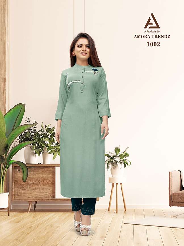 AMORA 1001 SERIES BY AMORA 1001 TO 1005 SERIES DESIGNER STYLISH FANCY COLORFUL BEAUTIFUL PARTY WEAR & ETHNIC WEAR COLLECTION PURE RAYON PRINT KURTIS WITH BOTTOM AT WHOLESALE PRICE