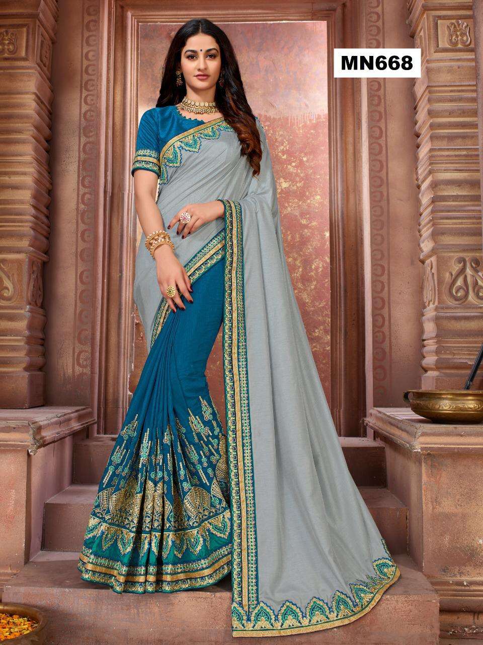 MANOHARI HIT DESIGN 668 BY MANOHARI INDIAN TRADITIONAL WEAR COLLECTION BEAUTIFUL STYLISH FANCY COLORFUL PARTY WEAR & OCCASIONAL WEAR DOLA SILK SAREES AT WHOLESALE PRICE