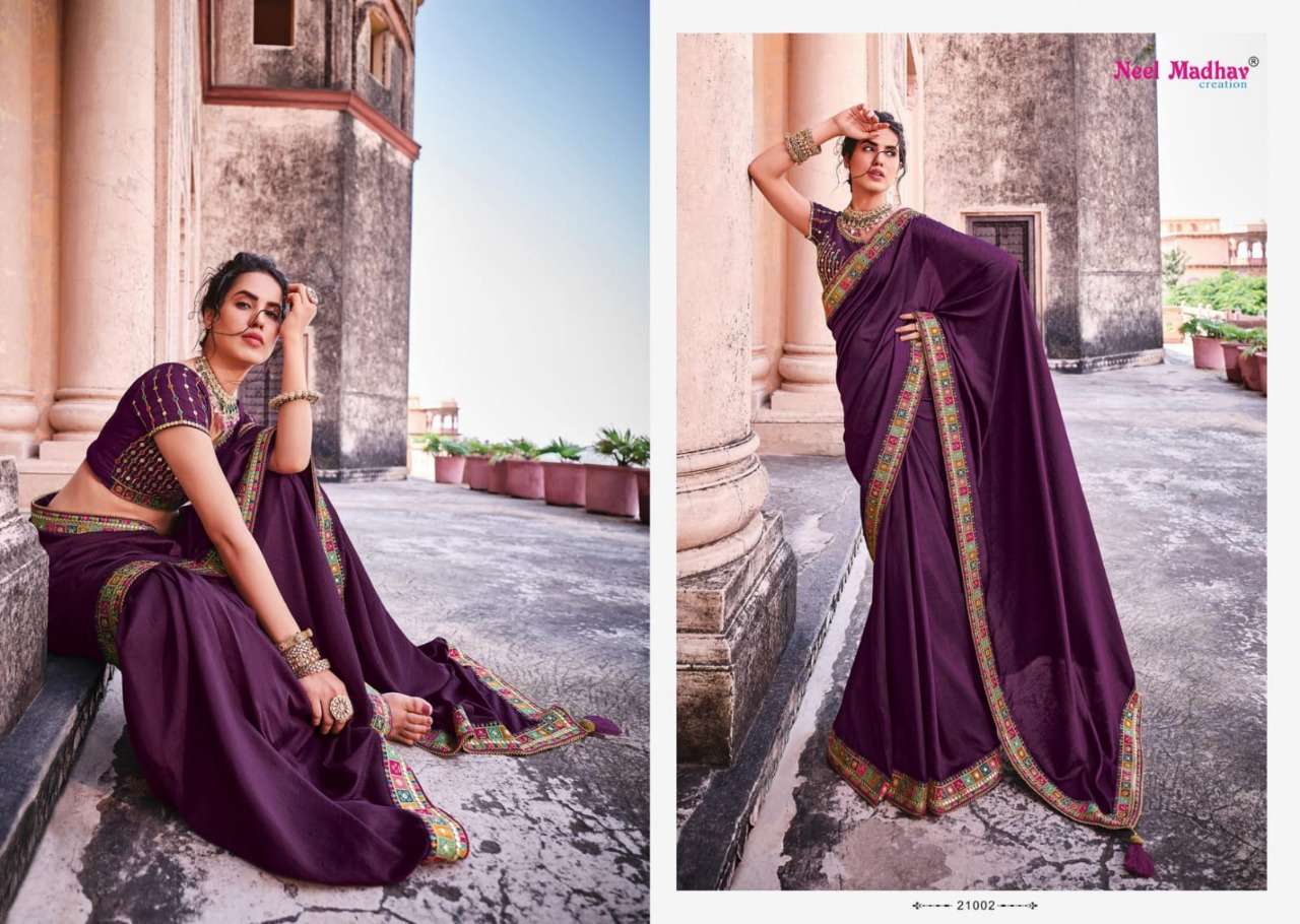 MIRISHA BY NEEL MADHAV 21001 TO 21015 SERIES INDIAN TRADITIONAL WEAR COLLECTION BEAUTIFUL STYLISH FANCY COLORFUL PARTY WEAR & OCCASIONAL WEAR FANCY SAREES AT WHOLESALE PRICE