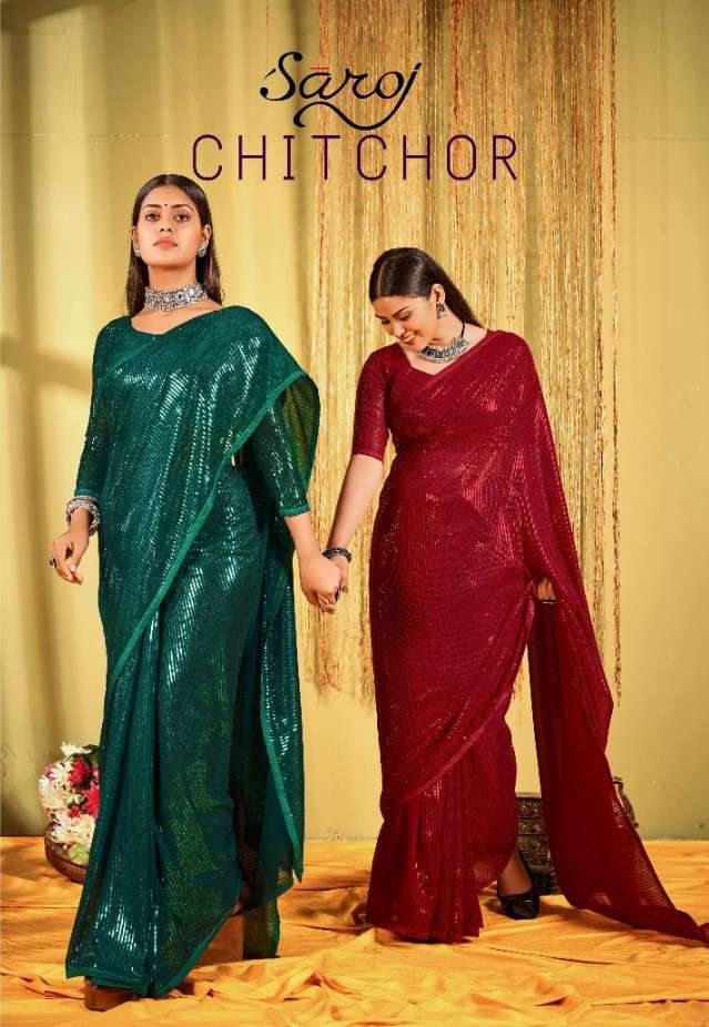 CHITCHOR BY SAROJ 1001 TO 1006 SERIES INDIAN TRADITIONAL WEAR COLLECTION BEAUTIFUL STYLISH FANCY COLORFUL PARTY WEAR & OCCASIONAL WEAR HEAVY GEORGETTE SAREES AT WHOLESALE PRICE