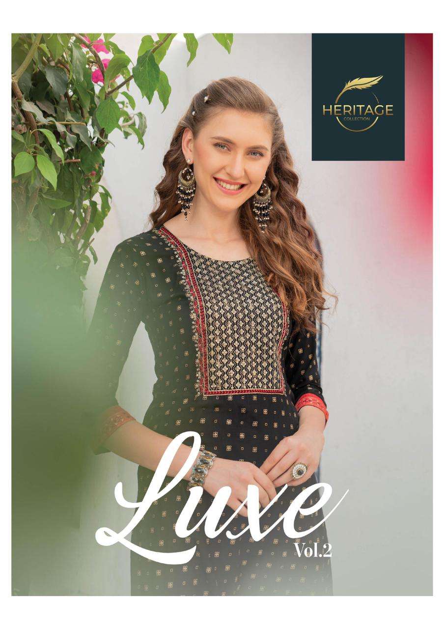 LUXE VOl-2 BY HERITAGE 201 TO 206 SERIES DESIGNER STYLISH FANCY COLORFUL BEAUTIFUL PARTY WEAR & ETHNIC WEAR COLLECTION RAYON KURTIS WITH BOTTOM AT WHOLESALE PRICE