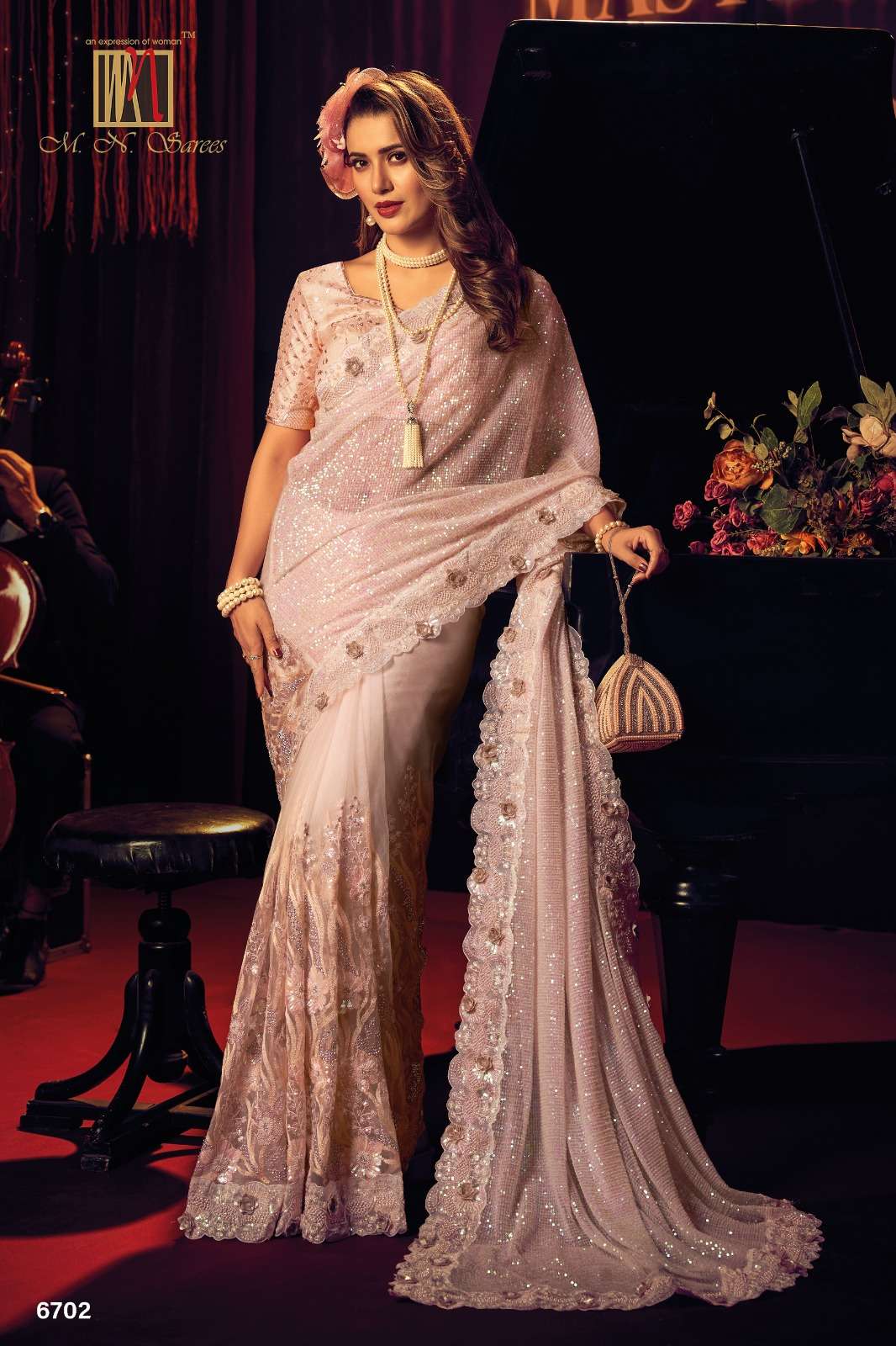 Swarovski Vol-6 By M.N. Sarees 6701 To 6712 Series Indian Traditional Wear Collection Beautiful Stylish Fancy Colorful Party Wear & Occasional Wear Net Sarees At Wholesale Price