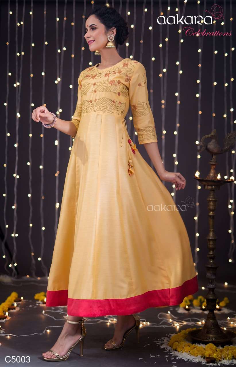 AAKARA CELEBRATION VOL-5 BY AAKARA 5001 TO 5006 SERIES BEAUTIFUL COLORFUL STYLISH FANCY PARTY WEAR & ETHNIC WEAR & READY TO WEAR HEAVY ZARI EMBROIDERY WITH TUSSLES GOWNS AT WHOLESALE PRICE