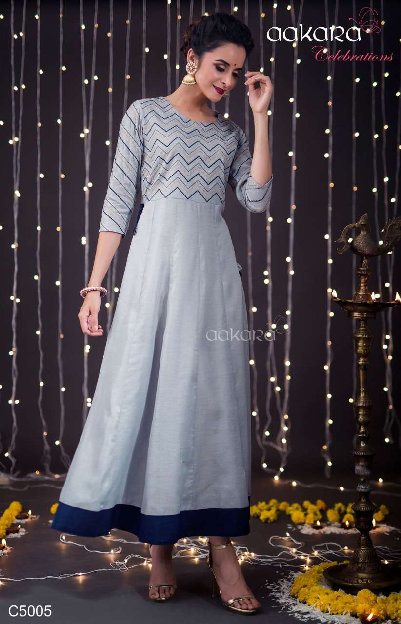 AAKARA CELEBRATION VOL-5 BY AAKARA 5001 TO 5006 SERIES BEAUTIFUL COLORFUL STYLISH FANCY PARTY WEAR & ETHNIC WEAR & READY TO WEAR HEAVY ZARI EMBROIDERY WITH TUSSLES GOWNS AT WHOLESALE PRICE