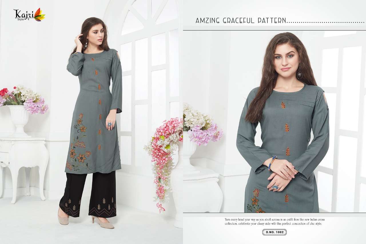NOOR VOL-5 BY KAJRI STYLE 1001 TO 1008 SERIES BEAUTIFUL COLORFUL STYLISH FANCY CASUAL WEAR & ETHNIC WEAR & READY TO WEAR RAYON WITH HEAVY WORK KURTIS AT WHOLESALE PRICE