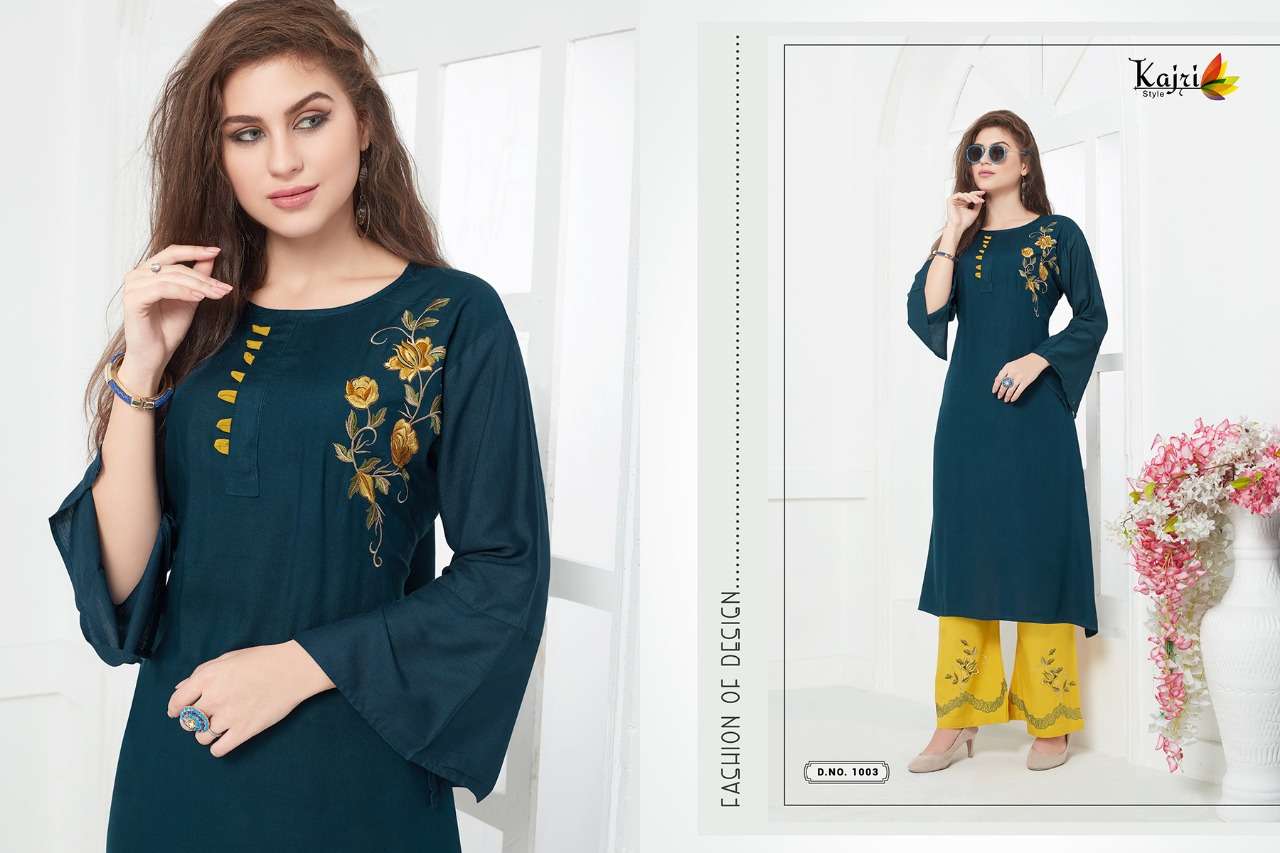 NOOR VOL-5 BY KAJRI STYLE 1001 TO 1008 SERIES BEAUTIFUL COLORFUL STYLISH FANCY CASUAL WEAR & ETHNIC WEAR & READY TO WEAR RAYON WITH HEAVY WORK KURTIS AT WHOLESALE PRICE