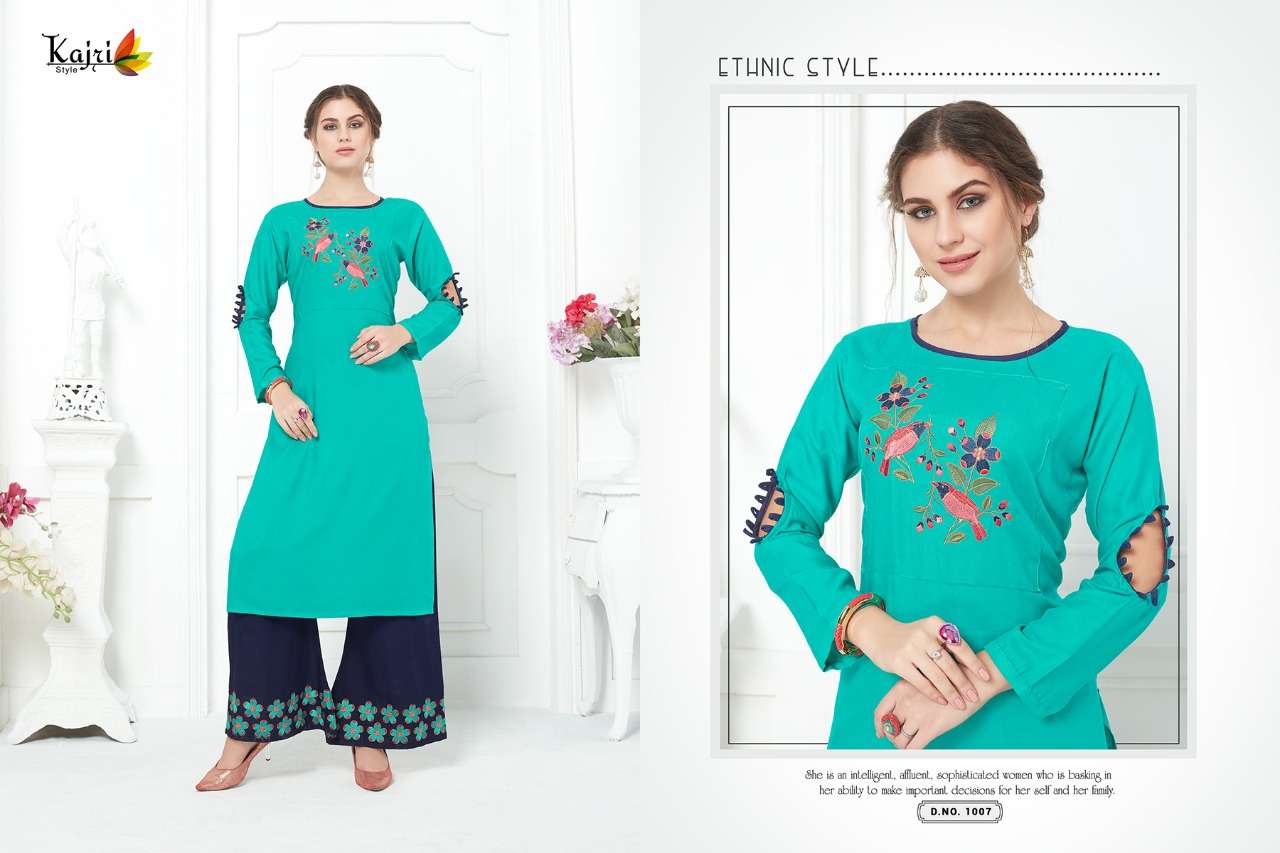 NOOR VOL-5 BY KAJRI STYLE 1001 TO 1008 SERIES BEAUTIFUL COLORFUL STYLISH FANCY CASUAL WEAR & ETHNIC WEAR & READY TO WEAR RAYON WITH HEAVY WORK KURTIS AT WHOLESALE PRICE