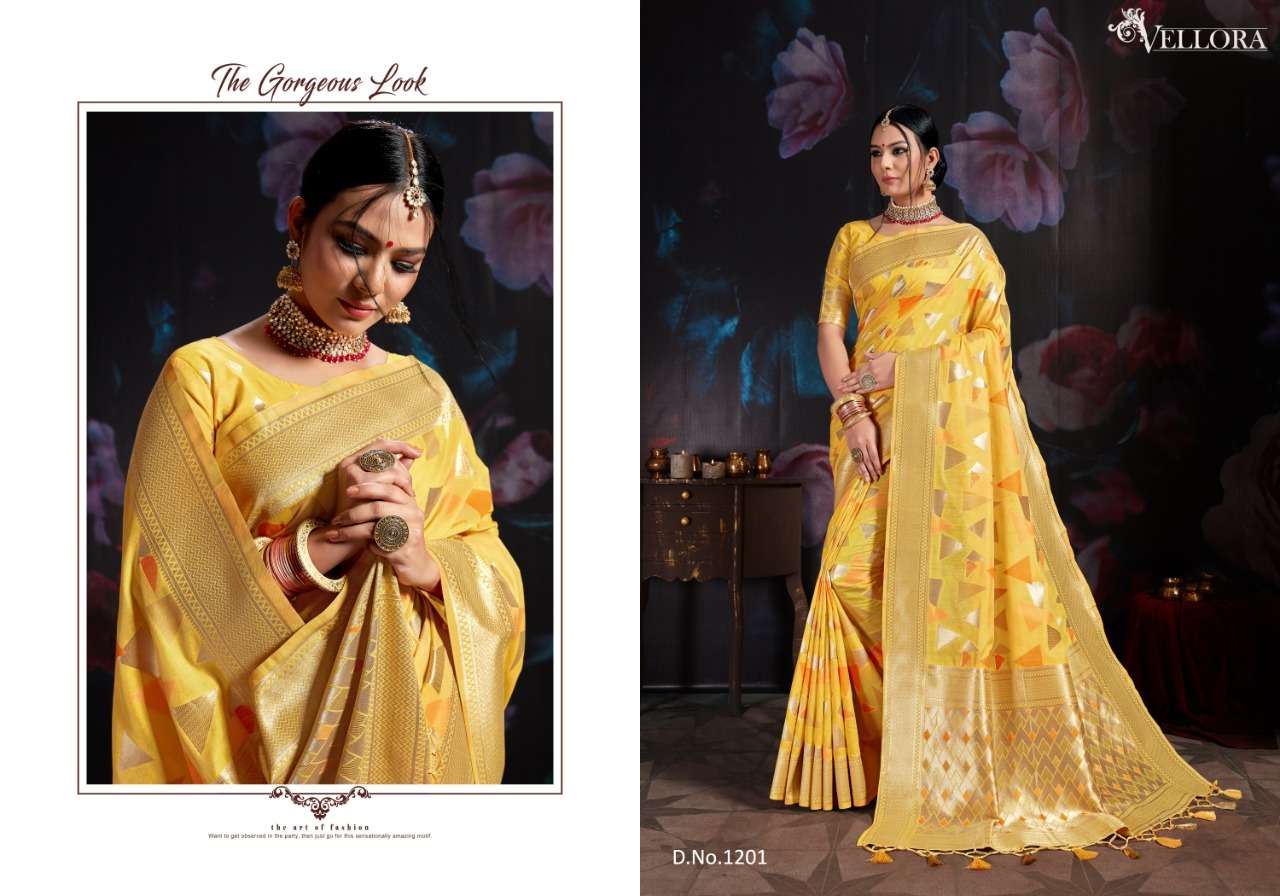 VELLORA SAREES VOL-3 BY VELLORA 1201 TO 1207 SERIES INDIAN TRADITIONAL WEAR COLLECTION BEAUTIFUL STYLISH FANCY COLORFUL PARTY WEAR & OCCASIONAL WEAR BANARASI COTTON SILK PRINTED SAREES AT WHOLESALE PRICE