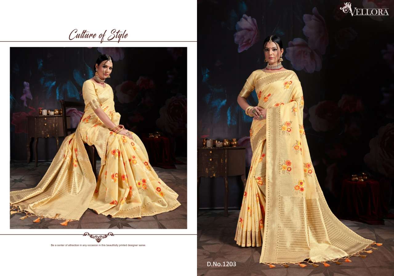 VELLORA SAREES VOL-3 BY VELLORA 1201 TO 1207 SERIES INDIAN TRADITIONAL WEAR COLLECTION BEAUTIFUL STYLISH FANCY COLORFUL PARTY WEAR & OCCASIONAL WEAR BANARASI COTTON SILK PRINTED SAREES AT WHOLESALE PRICE