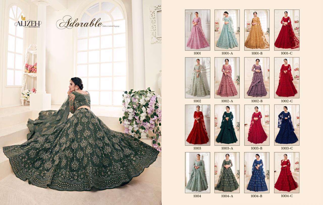 BRIDAL HERITAGE COLOUR SAGA BY ALIZEH 1001-A TO 1004-C SERIES BEAUTIFUL COLORFUL FANCY WEDDING COLLECTION OCCASIONAL WEAR & PARTY WEAR NET WITH SILK SATIN EMBROIDERY LEHENGAS AT WHOLESALE PRICE