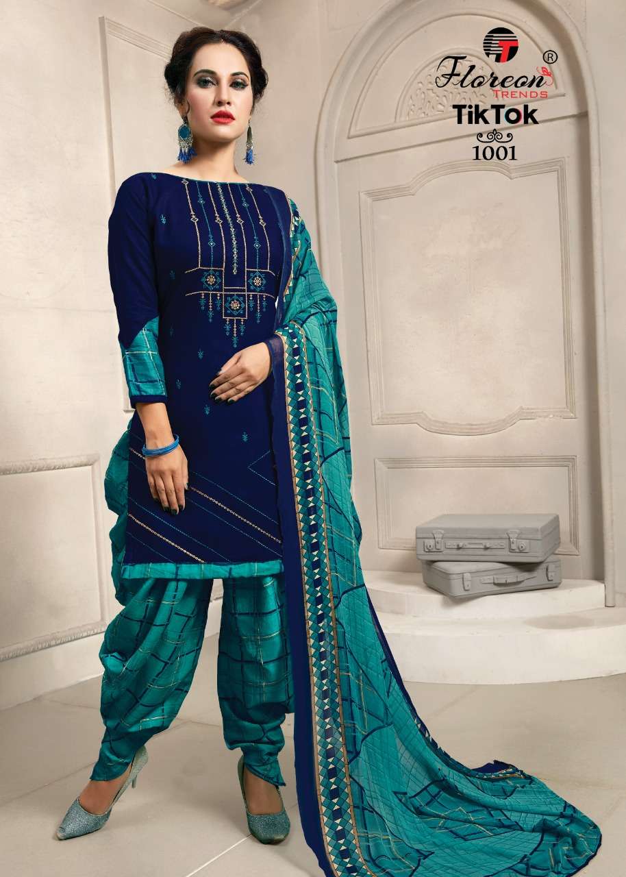TIK TOK BY FLOREON 1001 TO 1010 SERIES BEAUTIFUL SUITS STYLISH FANCY COLORFUL PARTY WEAR & OCCASIONAL WEAR HEAVY RAYON 14 KG WITH EMBROIDERY DRESSES AT WHOLESALE PRICE