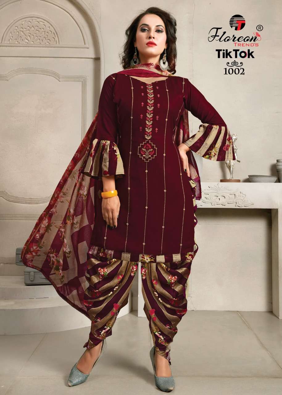 TIK TOK BY FLOREON 1001 TO 1010 SERIES BEAUTIFUL SUITS STYLISH FANCY COLORFUL PARTY WEAR & OCCASIONAL WEAR HEAVY RAYON 14 KG WITH EMBROIDERY DRESSES AT WHOLESALE PRICE