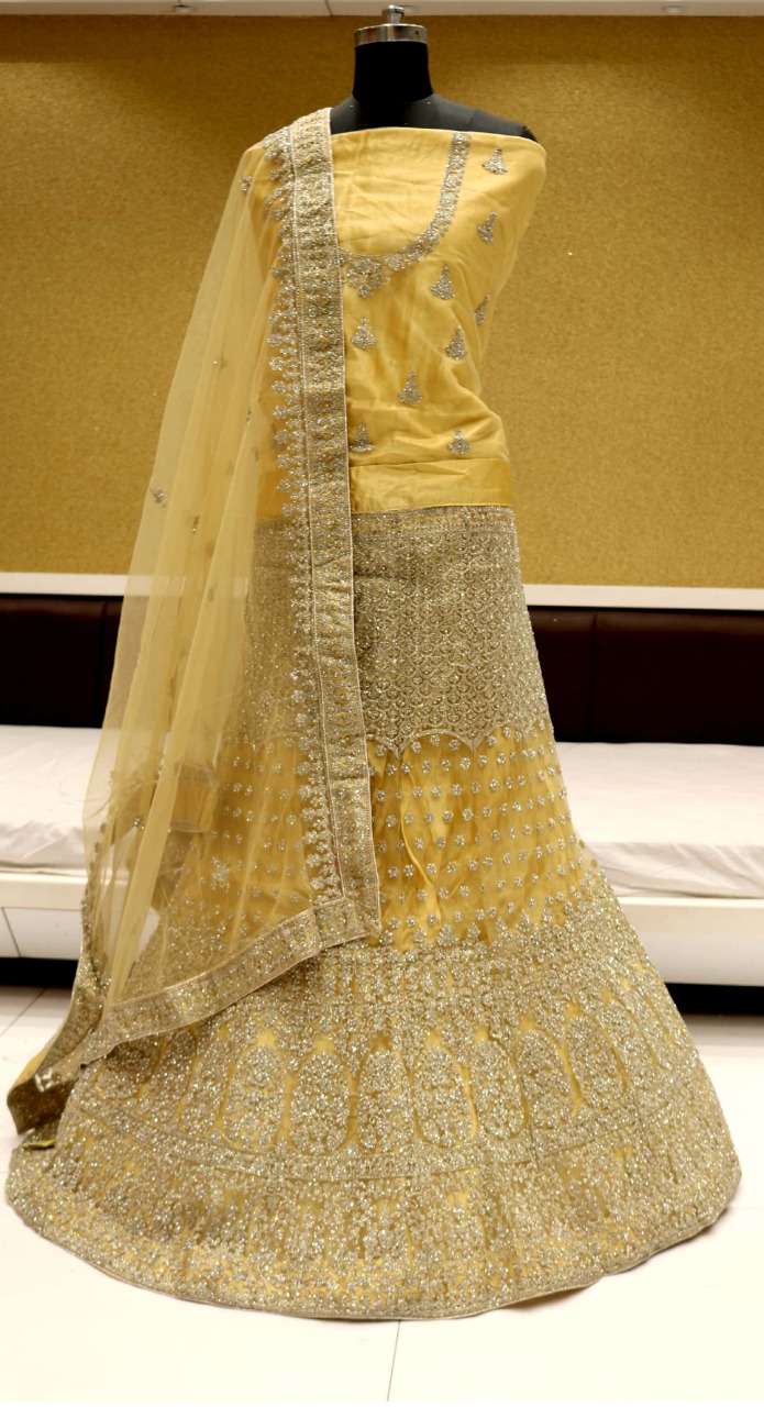 SPARK VOl-9 BY RIDDHOO FASHION 9001 TO 9004 SERIES BRIDAL WEAR COLLECTION BEAUTIFUL STYLISH COLORFUL FANCY PARTY WEAR & OCCASIONAL WEAR NET LEHENGAS AT WHOLESALE PRICE