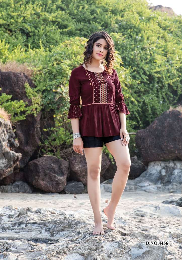 TOPSY VOL-11 BY YAMI FASHION 4451 TO 4459 SERIES BEAUTIFUL COLORFUL STYLISH FANCY CASUAL WEAR & READY TO WEAR RAYON EMBROIDERED TOPS AT WHOLESALE PRICE