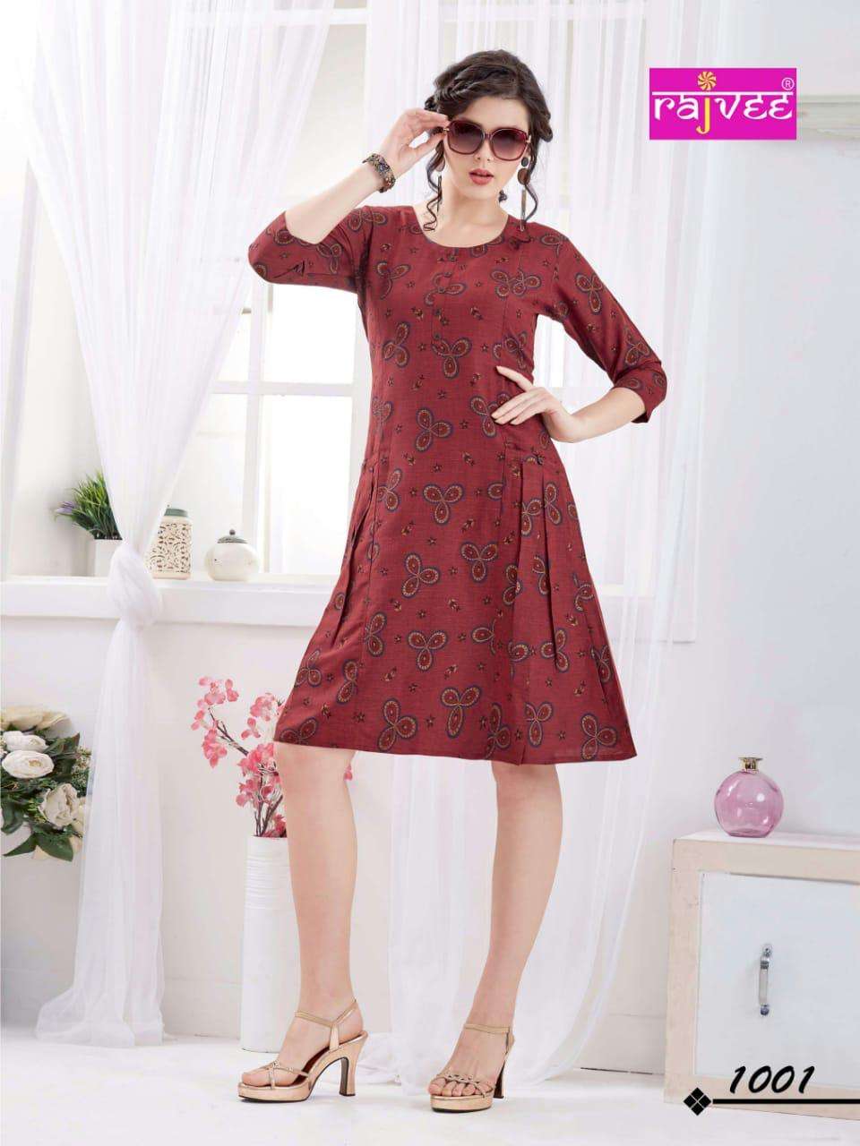 ICON PRINT BY RAJVEE 1001 TO 1008 SERIES BEAUTIFUL STYLISH FANCY COLORFUL CASUAL WEAR & ETHNIC WEAR RAYON CROSS PRINTED KURTIS AT WHOLESALE PRICE