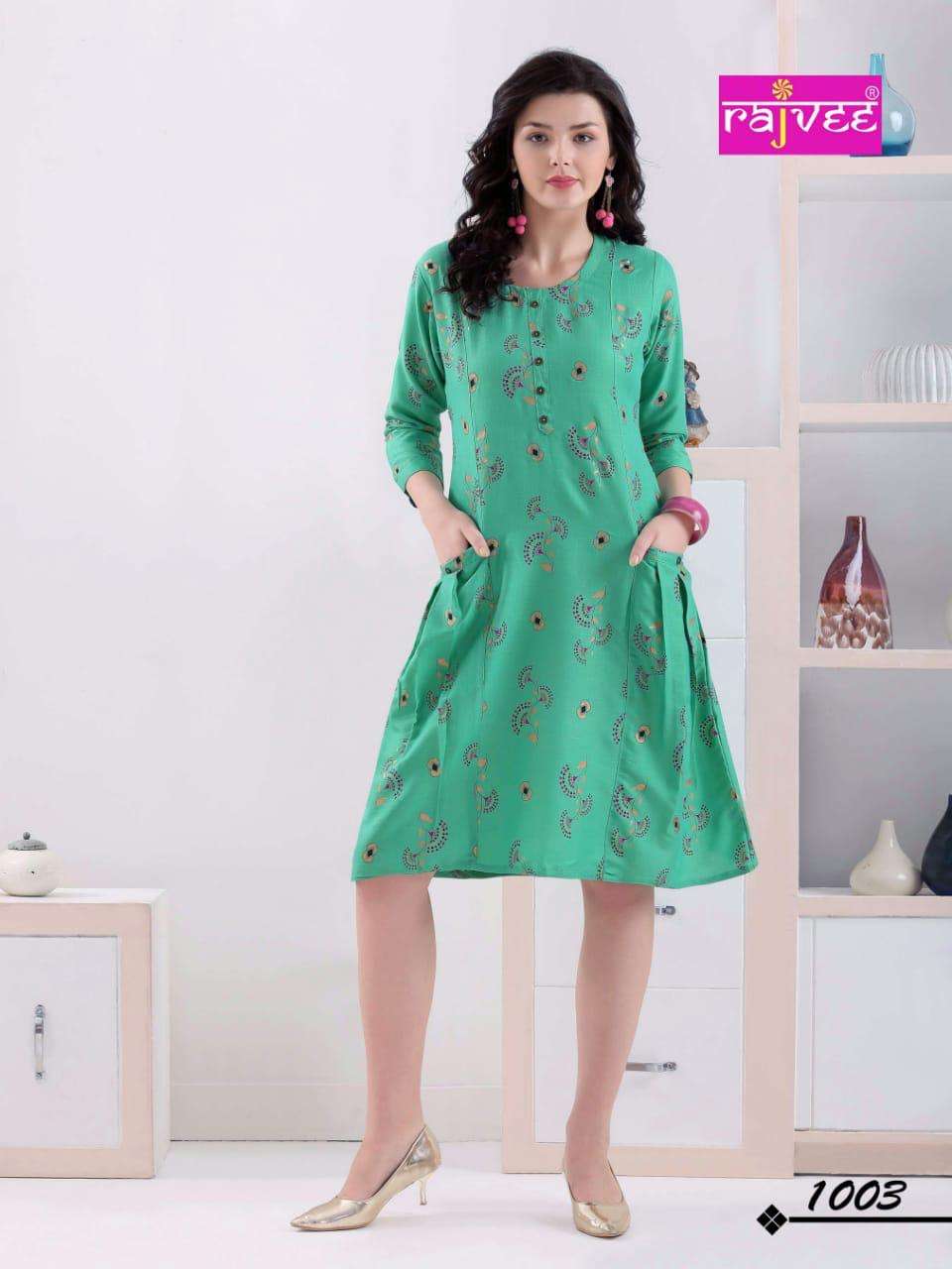 ICON PRINT BY RAJVEE 1001 TO 1008 SERIES BEAUTIFUL STYLISH FANCY COLORFUL CASUAL WEAR & ETHNIC WEAR RAYON CROSS PRINTED KURTIS AT WHOLESALE PRICE
