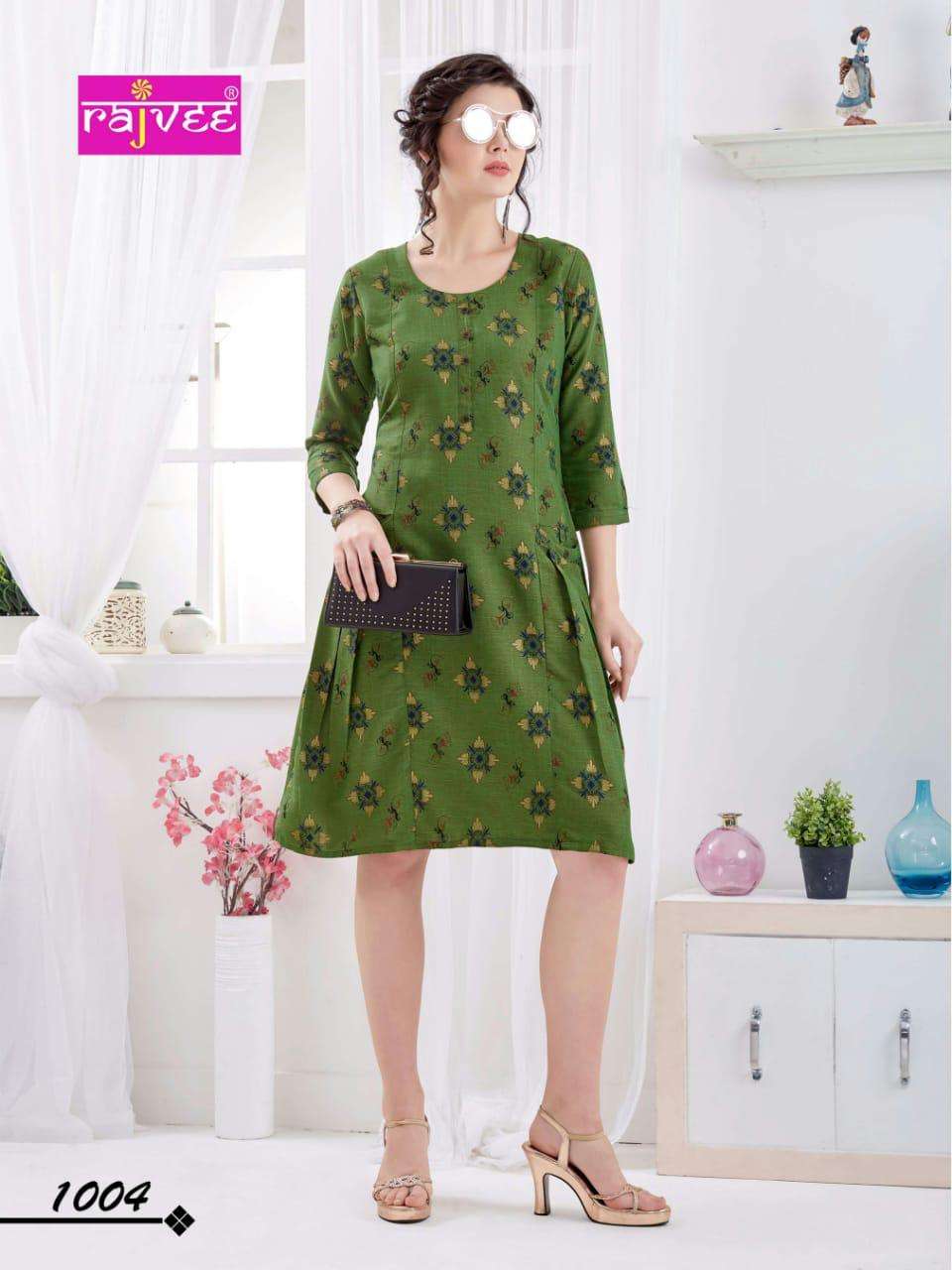 ICON PRINT BY RAJVEE 1001 TO 1008 SERIES BEAUTIFUL STYLISH FANCY COLORFUL CASUAL WEAR & ETHNIC WEAR RAYON CROSS PRINTED KURTIS AT WHOLESALE PRICE