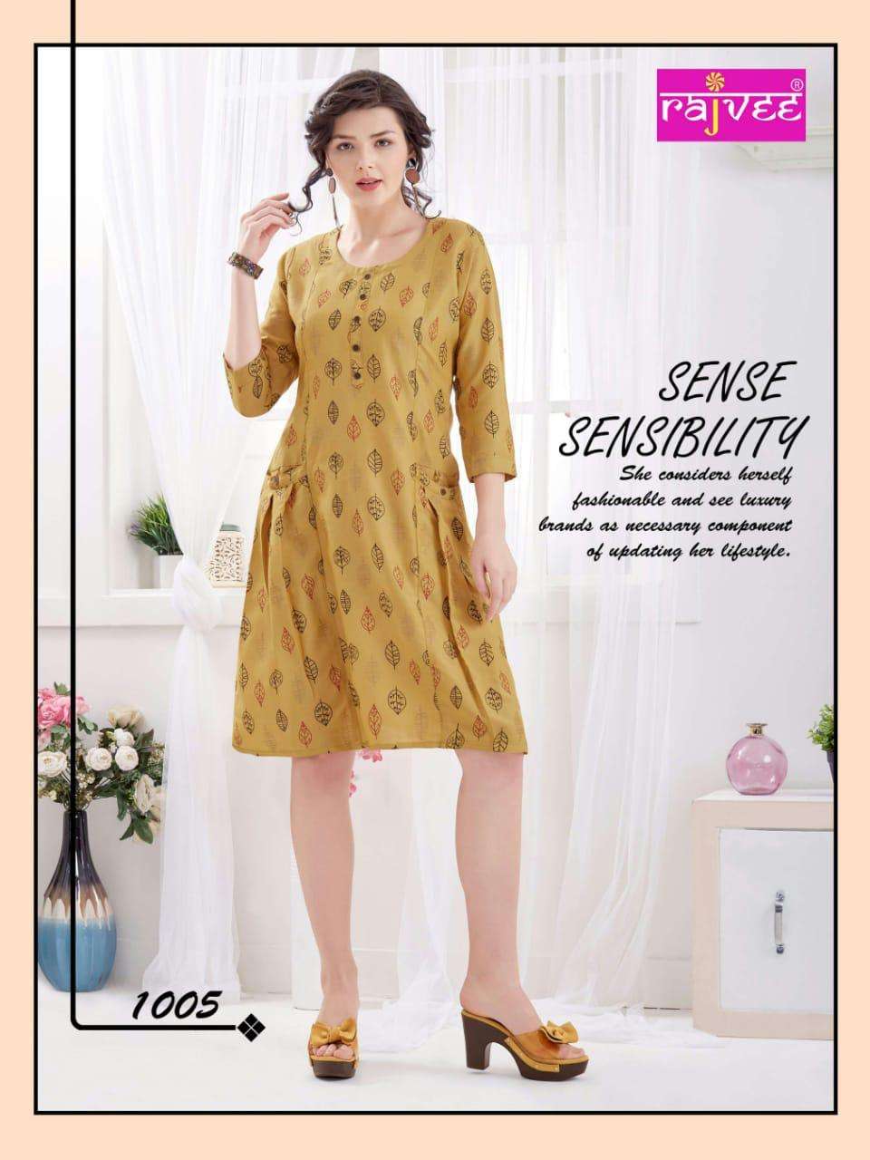 ICON PRINT BY RAJVEE 1001 TO 1008 SERIES BEAUTIFUL STYLISH FANCY COLORFUL CASUAL WEAR & ETHNIC WEAR RAYON CROSS PRINTED KURTIS AT WHOLESALE PRICE