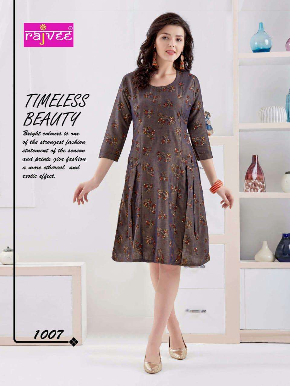 ICON PRINT BY RAJVEE 1001 TO 1008 SERIES BEAUTIFUL STYLISH FANCY COLORFUL CASUAL WEAR & ETHNIC WEAR RAYON CROSS PRINTED KURTIS AT WHOLESALE PRICE