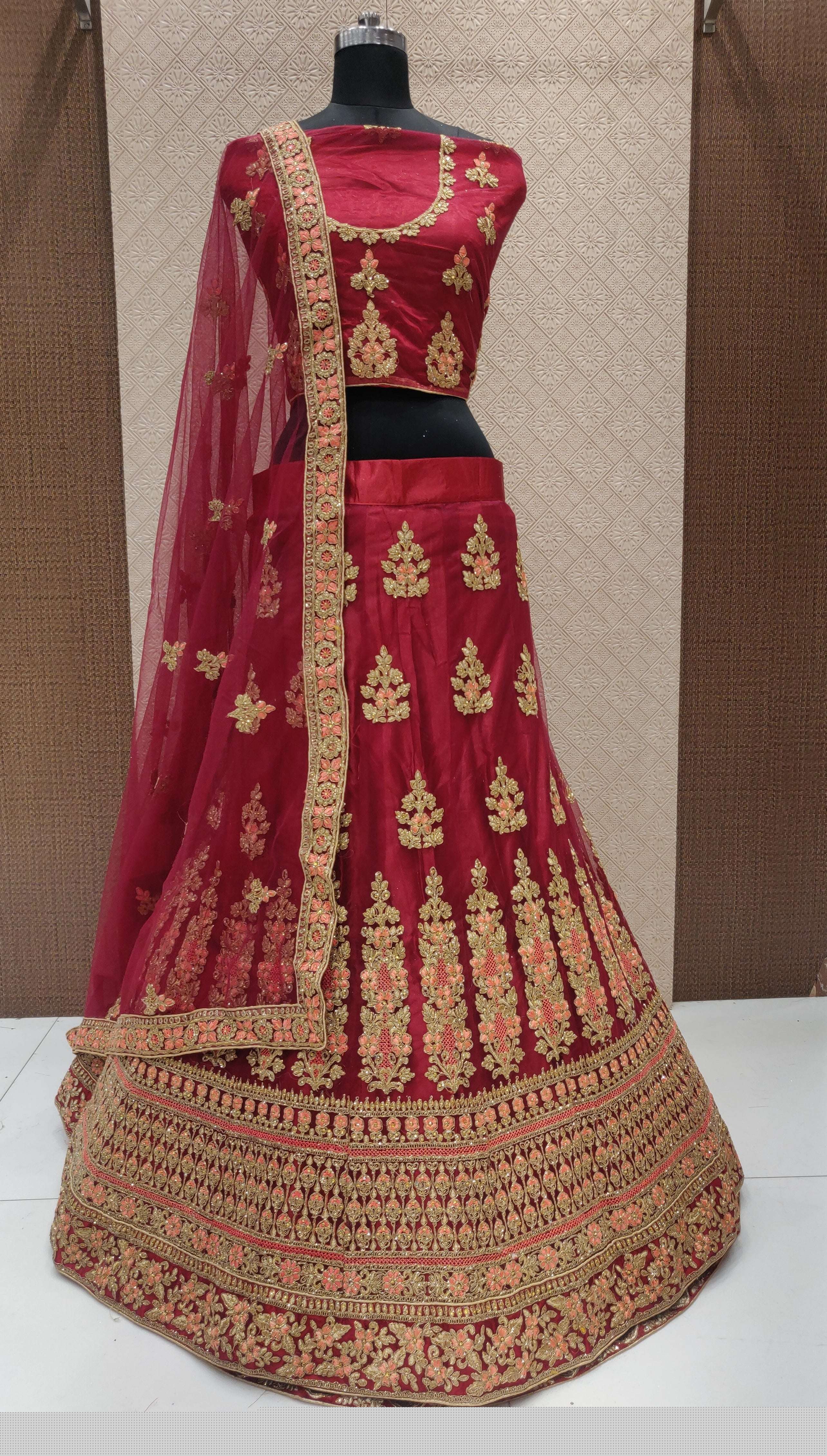 RANGMANCH BY FASHID WHOLESALE 1001 TO 1004 SERIES INDIAN DESIGNER TRADITIONAL WEAR COLLECTION BEAUTIFUL STYLISH FANCY COLORFUL PARTY WEAR & OCCASIONAL WEAR NET LEHENGAS AT WHOLESALE PRICE