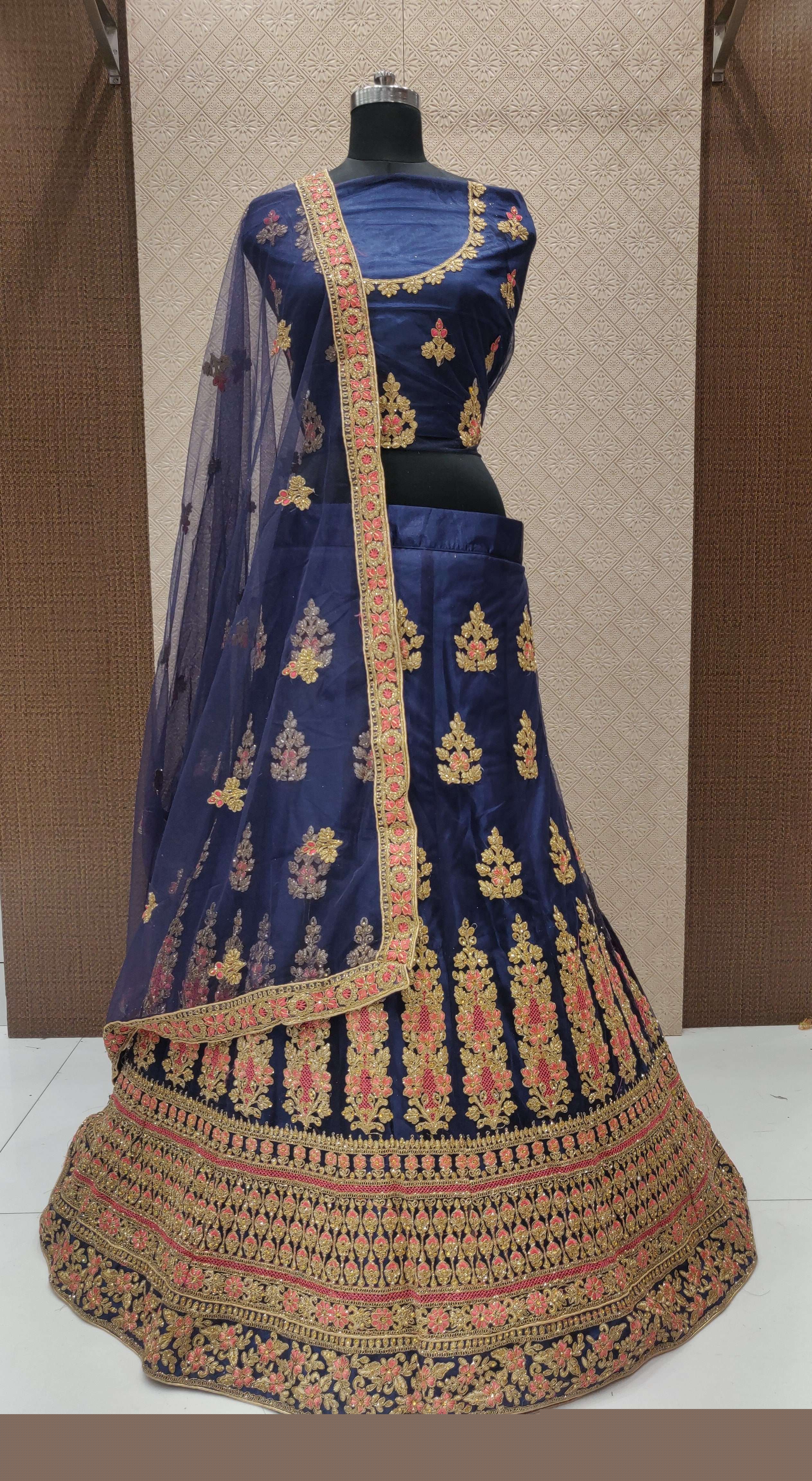 RANGMANCH BY FASHID WHOLESALE 1001 TO 1004 SERIES INDIAN DESIGNER TRADITIONAL WEAR COLLECTION BEAUTIFUL STYLISH FANCY COLORFUL PARTY WEAR & OCCASIONAL WEAR NET LEHENGAS AT WHOLESALE PRICE