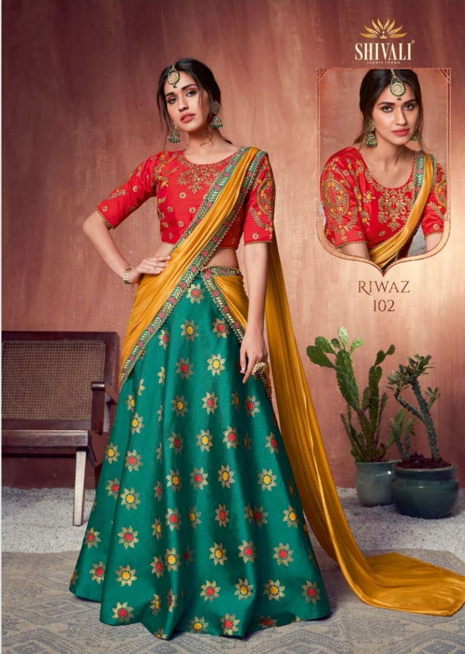 RIWAZ BY SHIVALI FASHION 101 TO 106 SERIES BEAUTIFUL COLORFUL FANCY WEDDING COLLECTION OCCASIONAL WEAR & PARTY WEAR FANCY LEHENGAS AT WHOLESALE PRICE