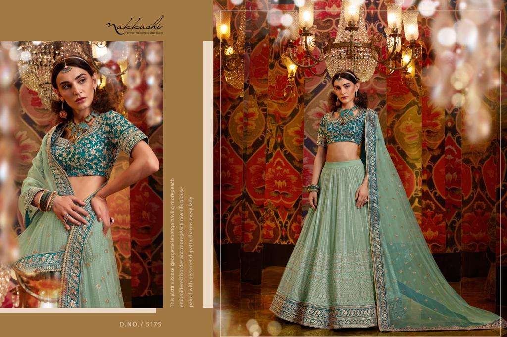 JASHN BY NAKKASHI 5173 TO 5183 SERIES BEAUTIFUL COLORFUL FANCY WEDDING COLLECTION OCCASIONAL WEAR & PARTY WEAR GREEN PURE RAW SILK LEHENGAS AT WHOLESALE PRICE