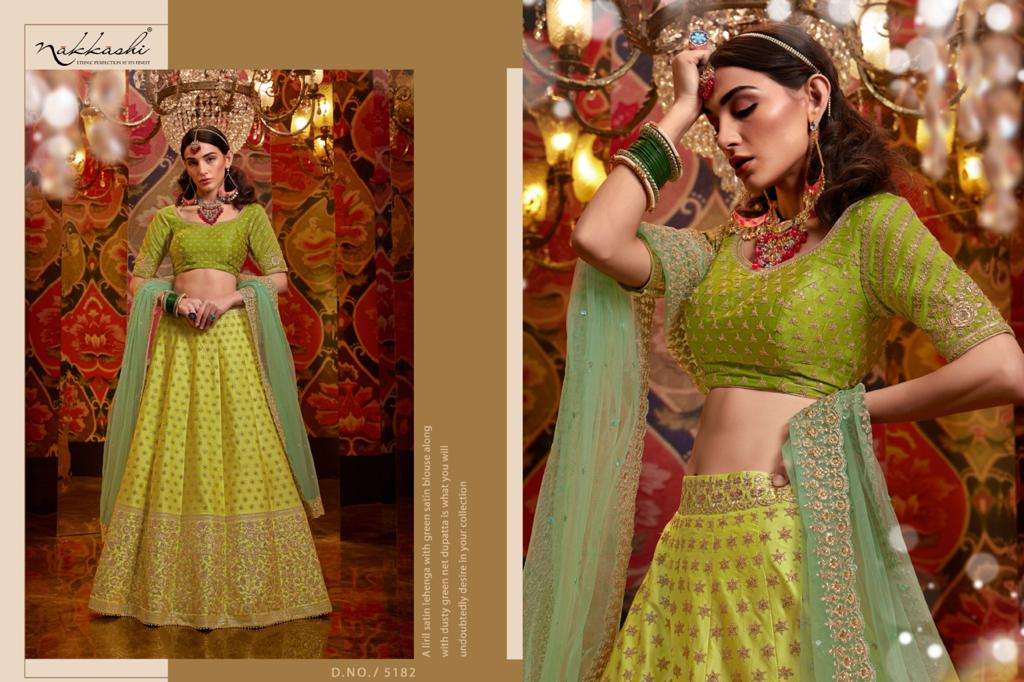 JASHN BY NAKKASHI 5173 TO 5183 SERIES BEAUTIFUL COLORFUL FANCY WEDDING COLLECTION OCCASIONAL WEAR & PARTY WEAR GREEN PURE RAW SILK LEHENGAS AT WHOLESALE PRICE