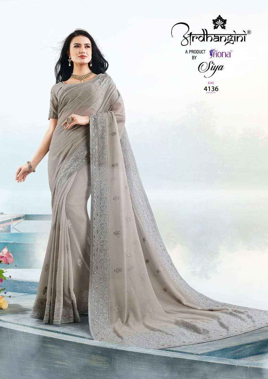 SIYA BY ARDHANGINI 4131 TO 4137 SERIES INDIAN TRADITIONAL WEAR COLLECTION BEAUTIFUL STYLISH FANCY COLORFUL PARTY WEAR & OCCASIONAL WEAR GEORGETTE WITH LUCKNOWI WORK SAREES AT WHOLESALE PRICE