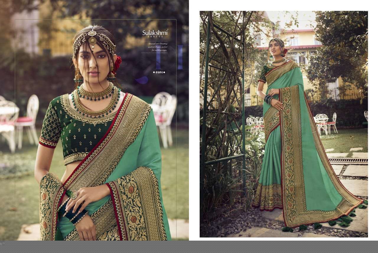 SUNSHINE BY SULAKSHMI 6401 TO 6409 SERIES INDIAN TRADITIONAL WEAR COLLECTION BEAUTIFUL STYLISH FANCY COLORFUL PARTY WEAR & OCCASIONAL WEAR CHINNON EMBROIDERY SAREES AT WHOLESALE PRICE