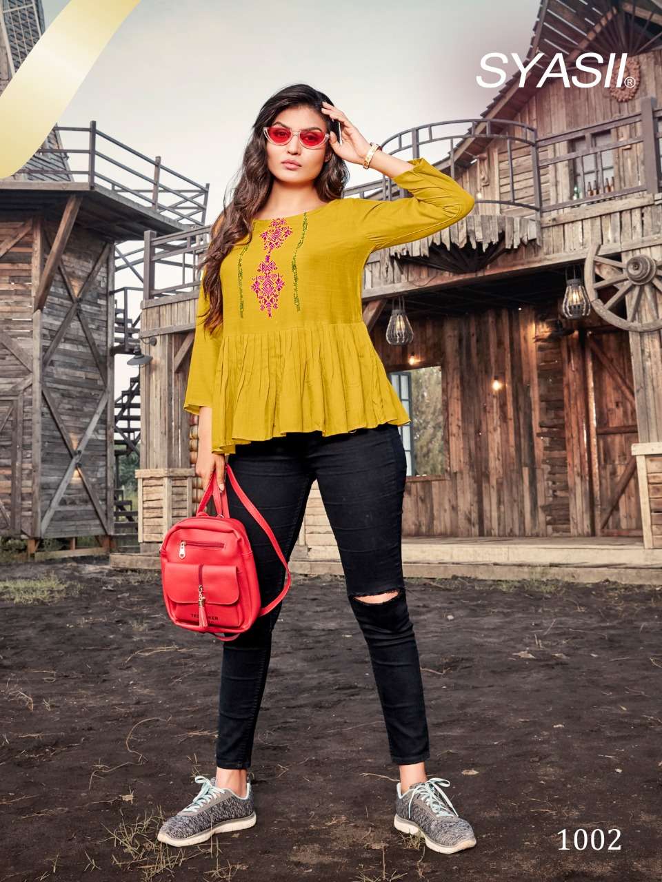 CELESTIA BY SYASII 1001 TO 1006 SERIES BEAUTIFUL COLORFUL STYLISH FANCY CASUAL WEAR & READY TO WEAR PURE RAYON SLUB EMBROIDERED TOPS AT WHOLESALE PRICE