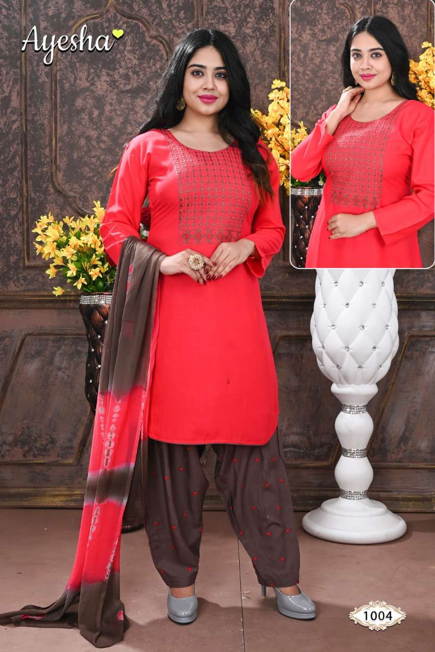 NIKKI VOL-1 BY AYESHA 1001 TO 1008 SERIES BEAUTIFUL STYLISH SHARARA SUITS FANCY COLORFUL CASUAL WEAR & ETHNIC WEAR & READY TO WEAR RAYON EMBROIDERED DRESSES AT WHOLESALE PRICE