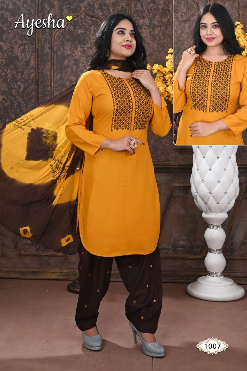 NIKKI VOL-1 BY AYESHA 1001 TO 1008 SERIES BEAUTIFUL STYLISH SHARARA SUITS FANCY COLORFUL CASUAL WEAR & ETHNIC WEAR & READY TO WEAR RAYON EMBROIDERED DRESSES AT WHOLESALE PRICE