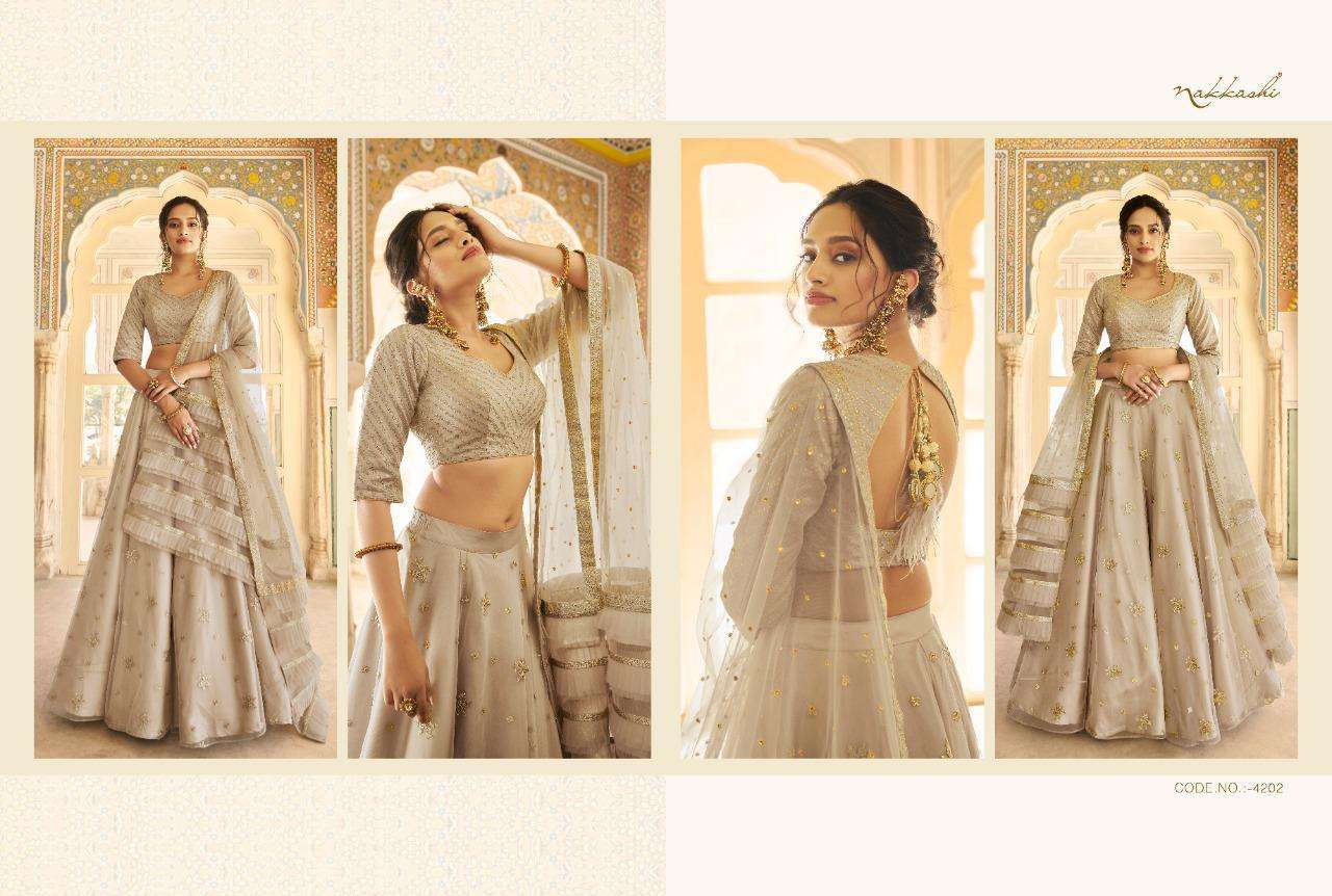 EIRA BY NAKKASHI 4201 TO 4207 SERIES BEAUTIFUL COLORFUL FANCY WEDDING COLLECTION OCCASIONAL WEAR & PARTY WEAR FANCY LEHENGAS AT WHOLESALE PRICE