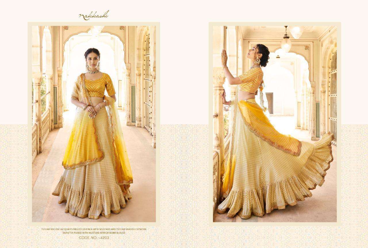EIRA BY NAKKASHI 4201 TO 4207 SERIES BEAUTIFUL COLORFUL FANCY WEDDING COLLECTION OCCASIONAL WEAR & PARTY WEAR FANCY LEHENGAS AT WHOLESALE PRICE