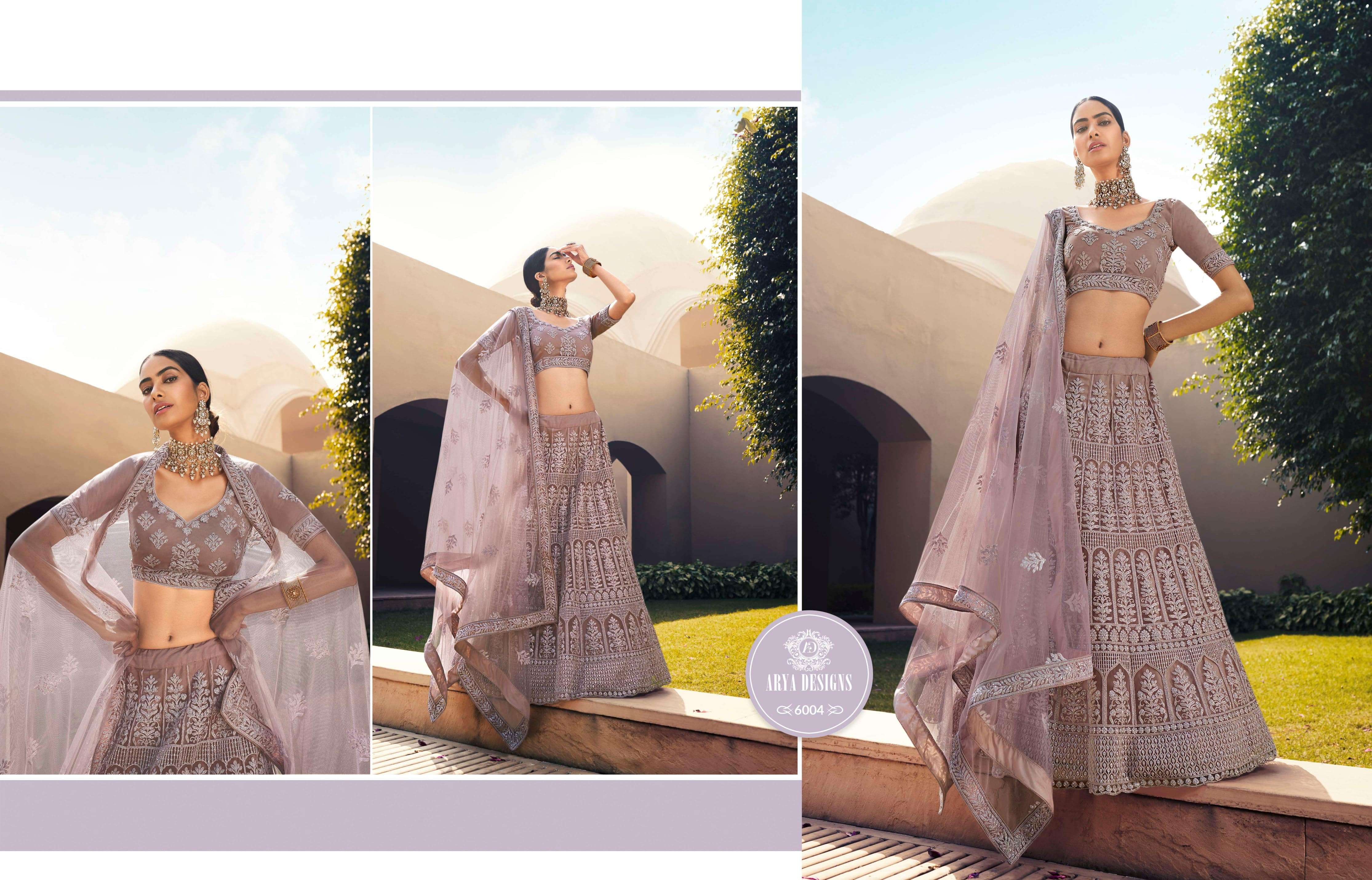 KHWAAB VOL-3 BY ARYA DESIGNS 6001 TO 6006 SERIES BEAUTIFUL COLORFUL FANCY WEDDING COLLECTION OCCASIONAL WEAR & PARTY WEAR SOFT NET LEHENGAS AT WHOLESALE PRICE