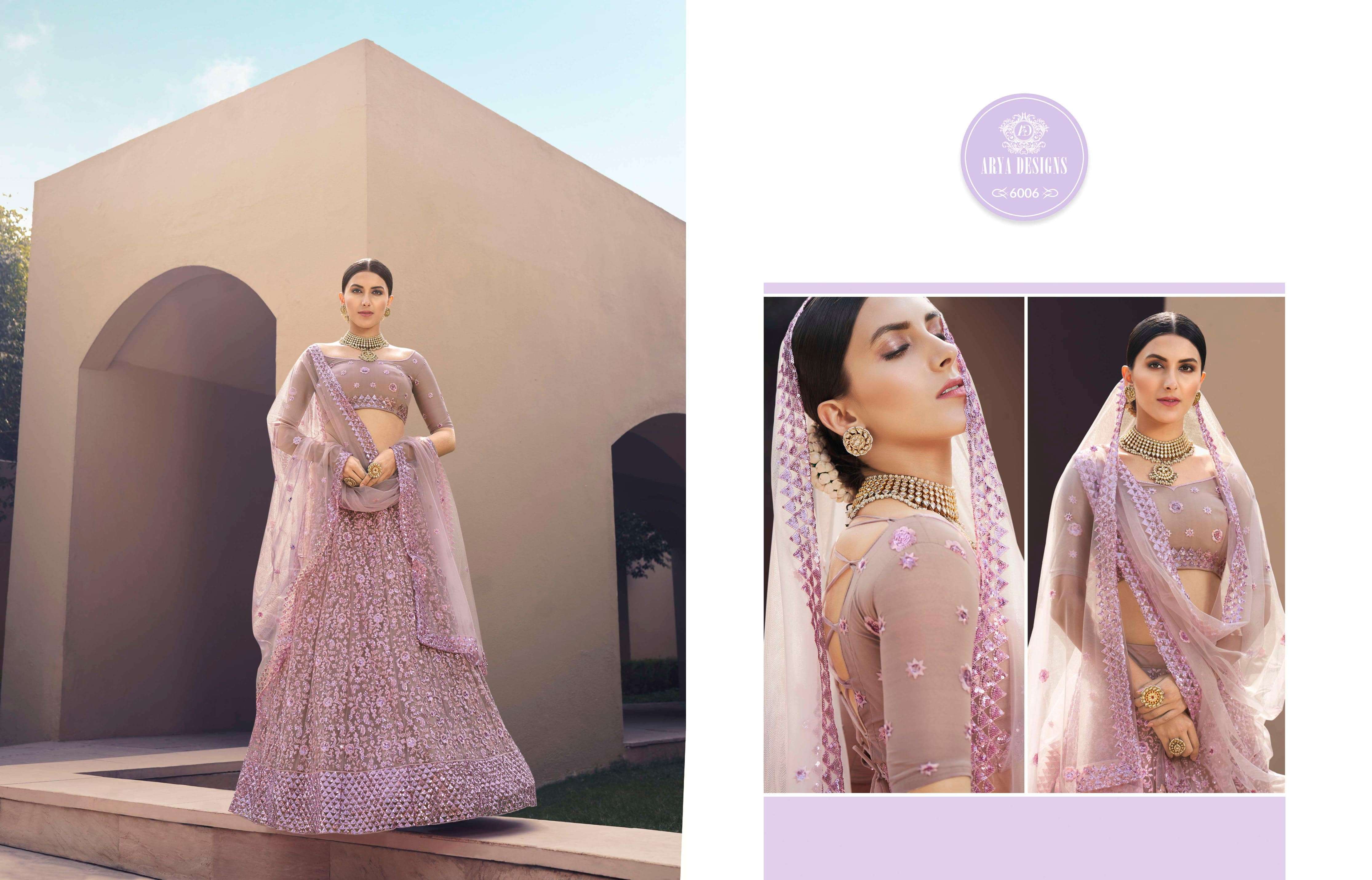 KHWAAB VOL-3 BY ARYA DESIGNS 6001 TO 6006 SERIES BEAUTIFUL COLORFUL FANCY WEDDING COLLECTION OCCASIONAL WEAR & PARTY WEAR SOFT NET LEHENGAS AT WHOLESALE PRICE