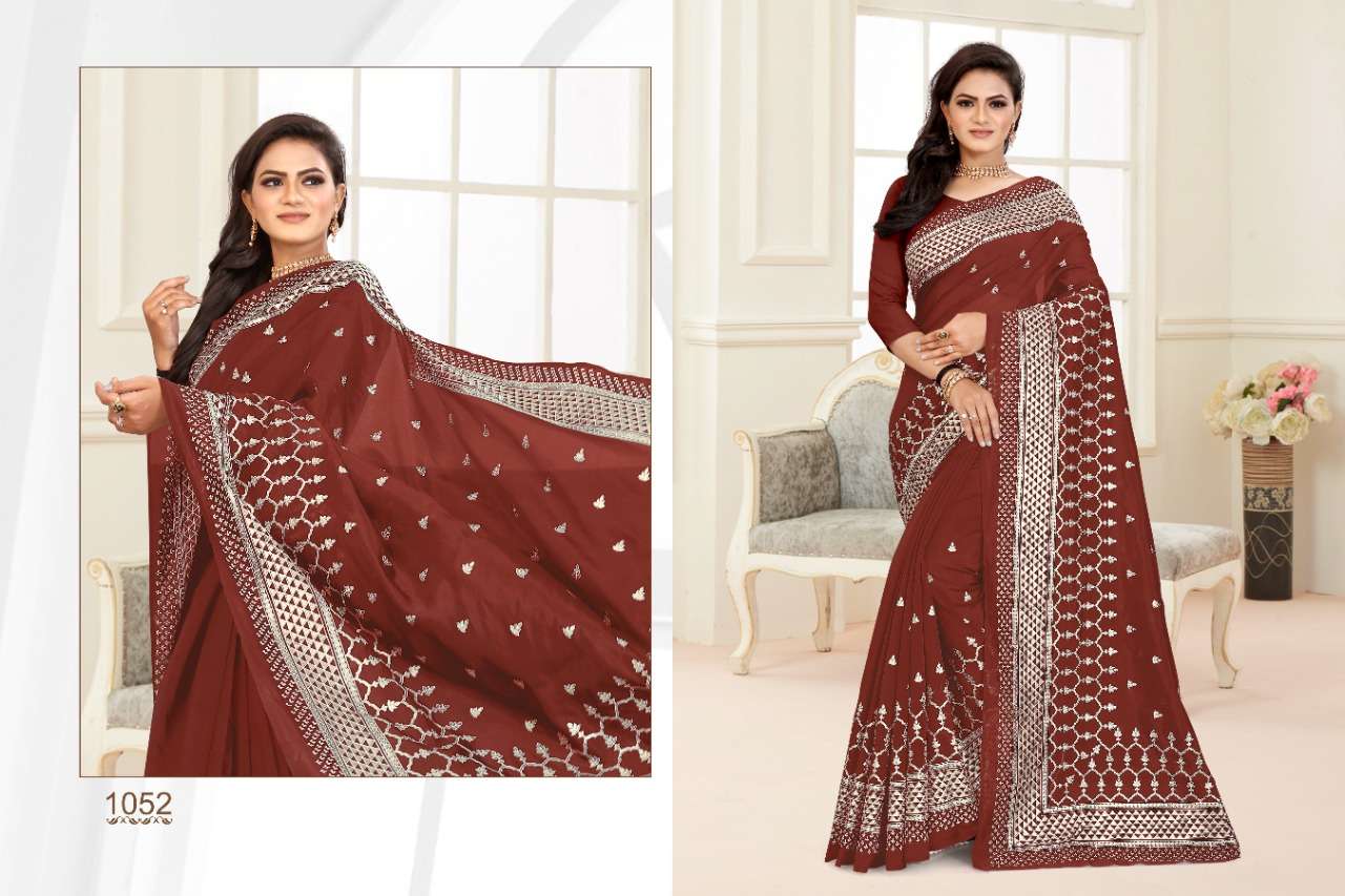 CRYSTA BY BALARKAS 1051 TO 1054 SERIES INDIAN TRADITIONAL WEAR COLLECTION BEAUTIFUL STYLISH FANCY COLORFUL PARTY WEAR & OCCASIONAL WEAR SOFT ORGANZA FOIL PRINT SAREES AT WHOLESALE PRICE