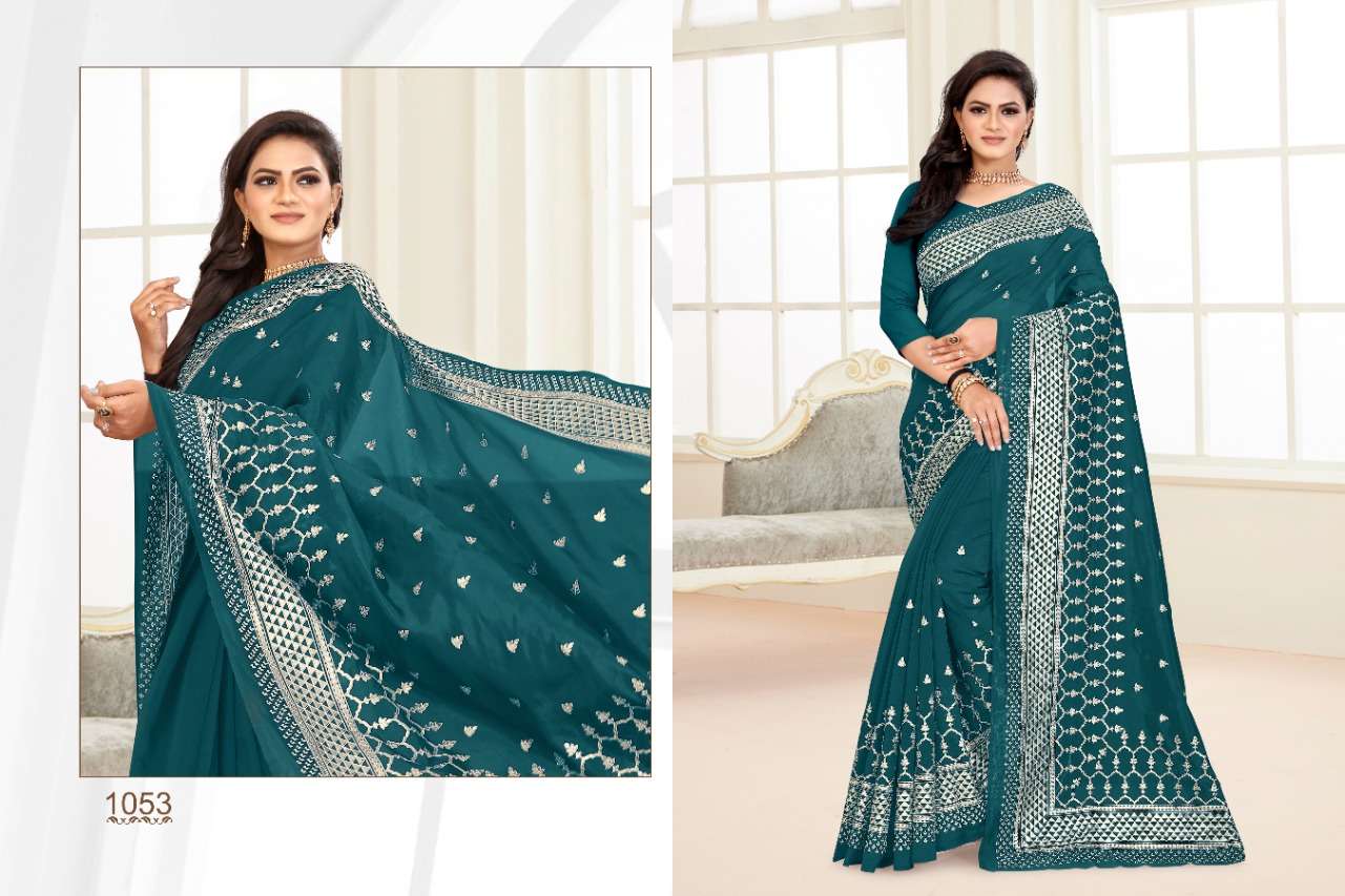 CRYSTA BY BALARKAS 1051 TO 1054 SERIES INDIAN TRADITIONAL WEAR COLLECTION BEAUTIFUL STYLISH FANCY COLORFUL PARTY WEAR & OCCASIONAL WEAR SOFT ORGANZA FOIL PRINT SAREES AT WHOLESALE PRICE