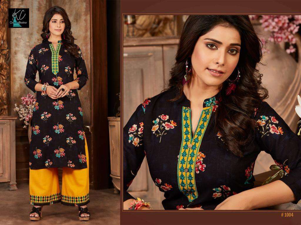 NOOR VOL-14 BY KC 1001 TO 1008 SERIES BEAUTIFUL STYLISH FANCY COLORFUL CASUAL WEAR & ETHNIC WEAR & READY TO WEAR RAYON PRINTED KURTIS WITH BOTTOM AT WHOLESALE PRICE