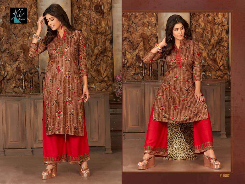 NOOR VOL-14 BY KC 1001 TO 1008 SERIES BEAUTIFUL STYLISH FANCY COLORFUL CASUAL WEAR & ETHNIC WEAR & READY TO WEAR RAYON PRINTED KURTIS WITH BOTTOM AT WHOLESALE PRICE