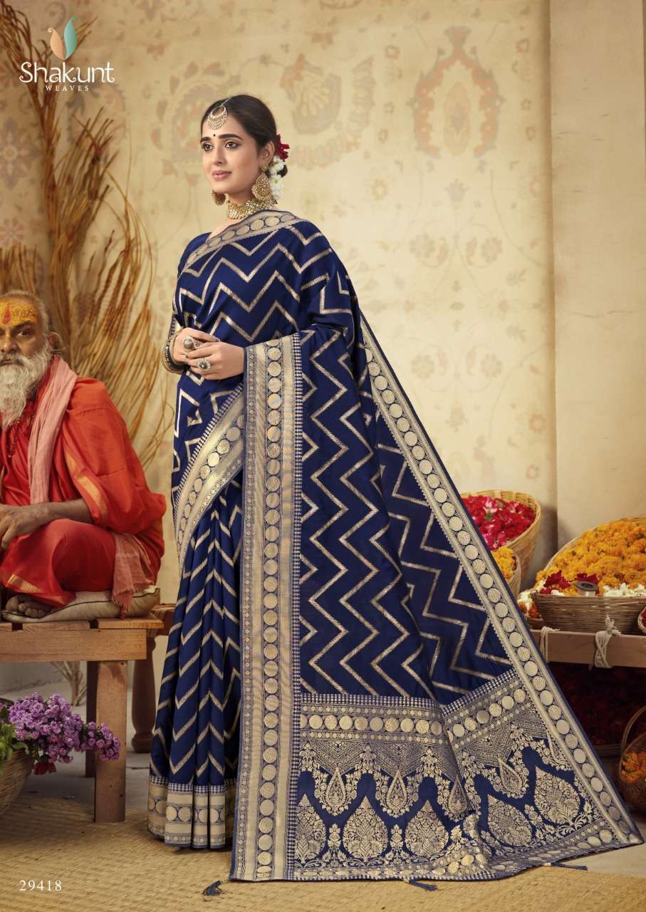 SKS VOL-51 BY SHAKUNT 29411 TO 29418 SERIES INDIAN TRADITIONAL WEAR COLLECTION BEAUTIFUL STYLISH FANCY COLORFUL PARTY WEAR & OCCASIONAL WEAR SOFT SILK SAREES AT WHOLESALE PRICE