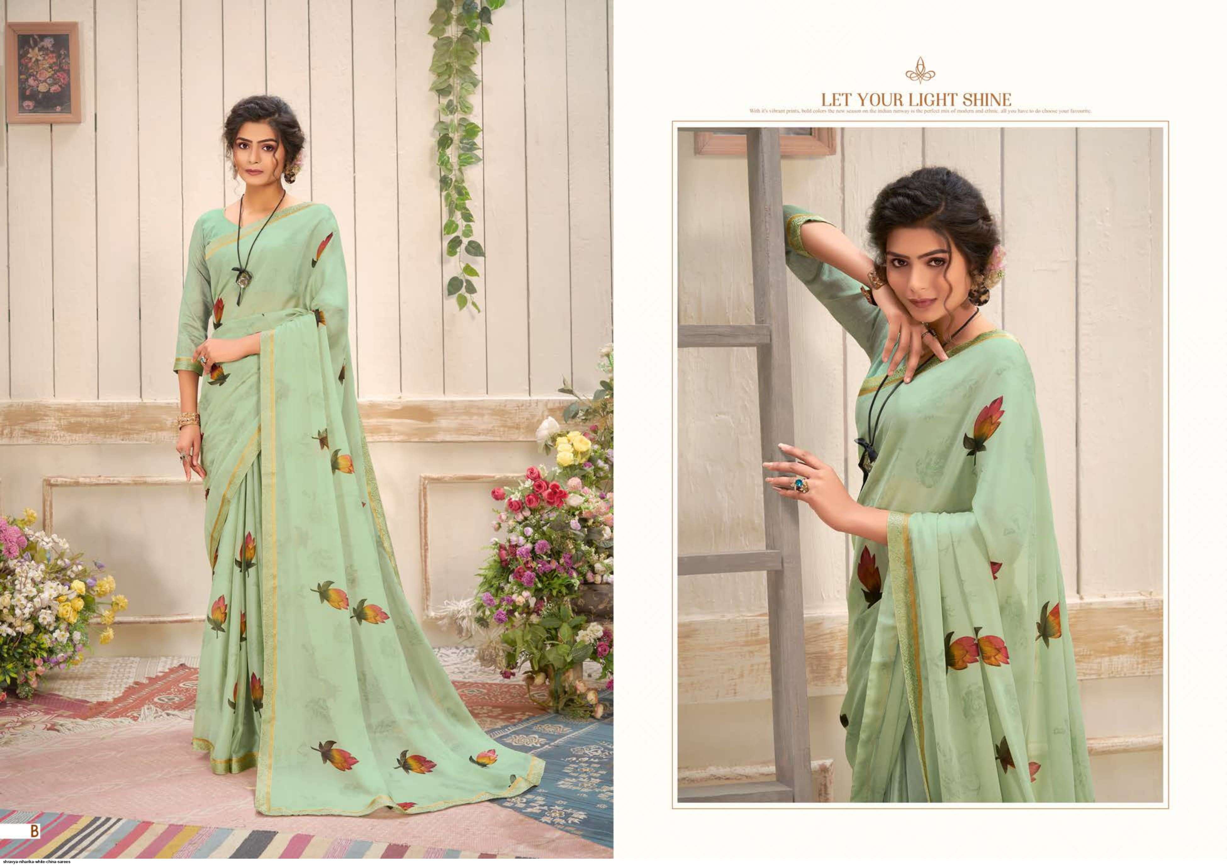 NIHARIKA BY SHRAVYA A TO H SERIES INDIAN TRADITIONAL WEAR COLLECTION BEAUTIFUL STYLISH FANCY COLORFUL PARTY WEAR & OCCASIONAL WEAR WHITE CHINA SAREES AT WHOLESALE PRICE