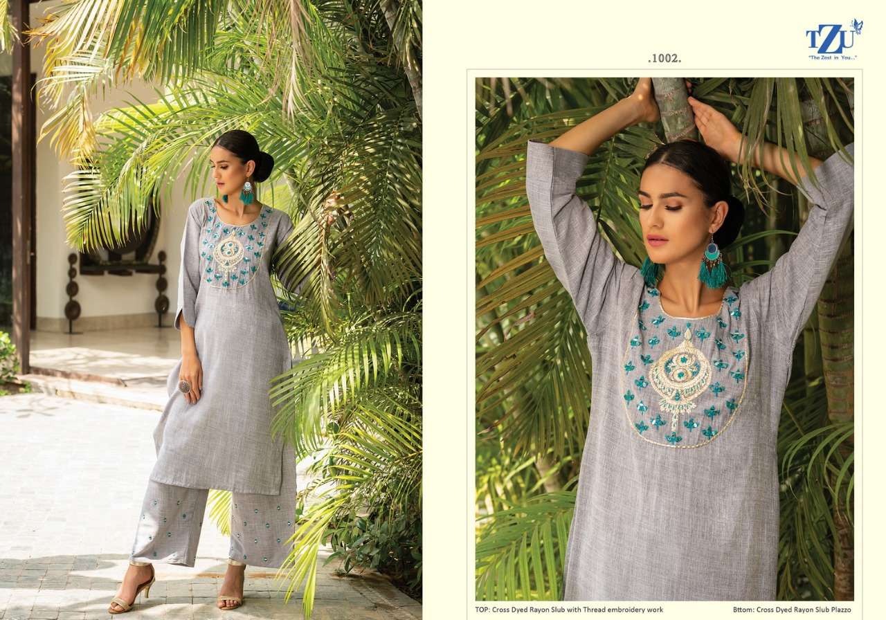GLAZED BY TZU 1001 TO 1004 SERIES DESIGNER STYLISH FANCY COLORFUL BEAUTIFUL PARTY WEAR & ETHNIC WEAR COLLECTION RAYON SLUB EMBROIDERY KURTIS WITH BOTTOM AT WHOLESALE PRICE