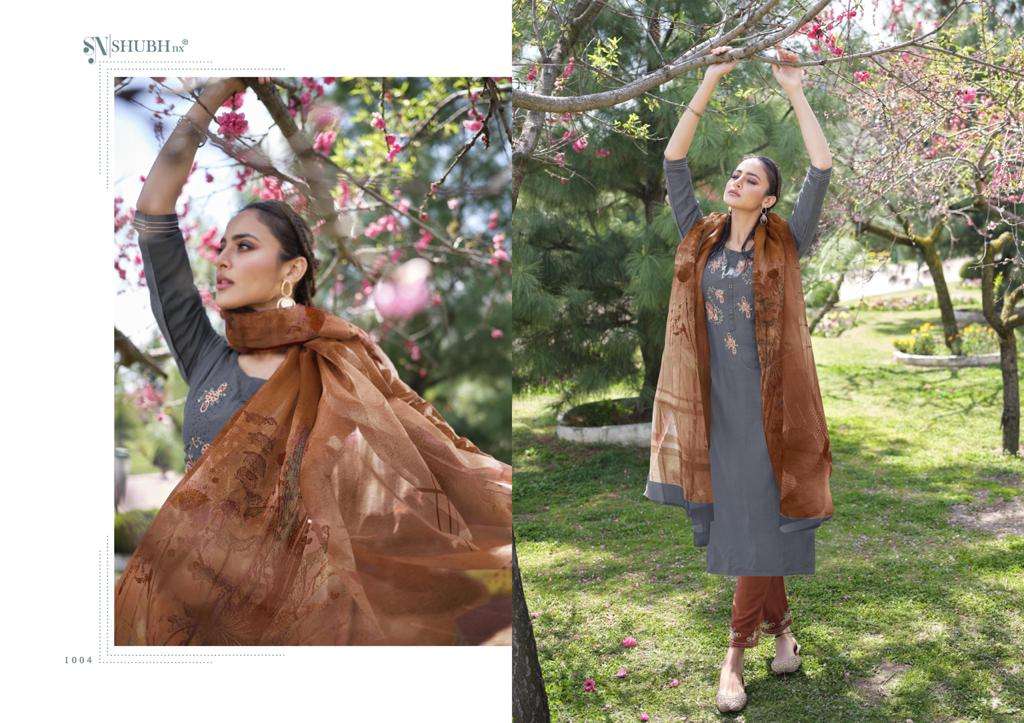 KELLY BY SHUBH NX 1001 TO 1006 SERIES BEAUTIFUL SUITS COLORFUL STYLISH FANCY CASUAL WEAR & ETHNIC WEAR CHINNON EMBROIDERED DRESSES AT WHOLESALE PRICE