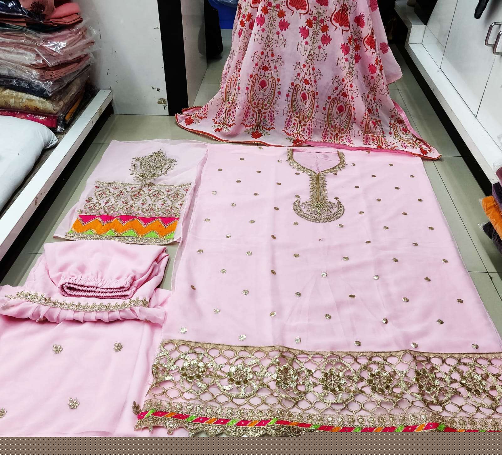 STYLE FASHION HIT DESIGN 3001 COLOURS BY STYLE FASHION 3001-A TO 3001-D SERIES DESIGNER PAKISTANI SUITS BEAUTIFUL STYLISH FANCY COLORFUL PARTY WEAR & OCCASIONAL WEAR HEAVY GEORGETTE EMBROIDERED DRESSES AT WHOLESALE PRICE