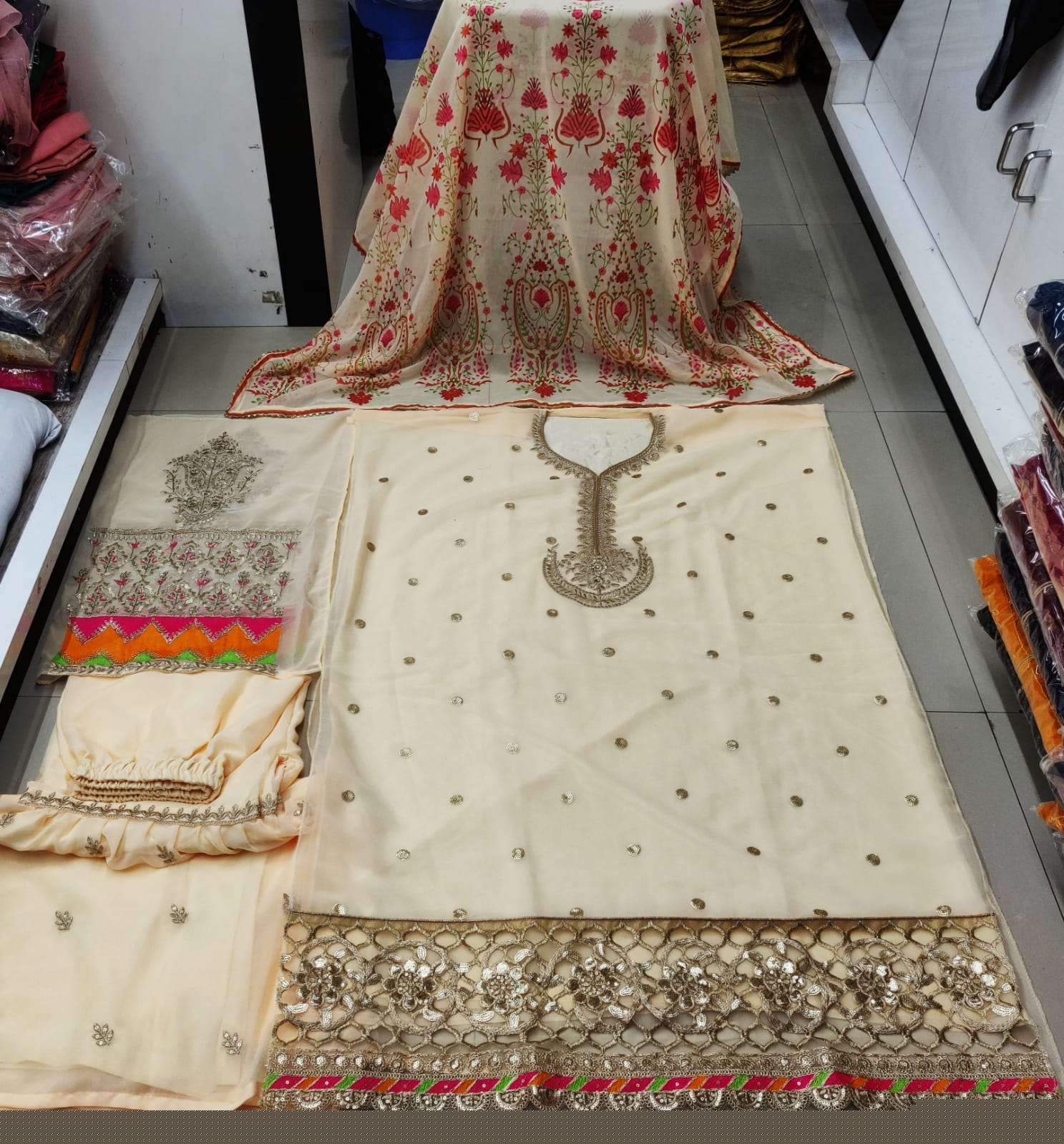 STYLE FASHION HIT DESIGN 3001 COLOURS BY STYLE FASHION 3001-A TO 3001-D SERIES DESIGNER PAKISTANI SUITS BEAUTIFUL STYLISH FANCY COLORFUL PARTY WEAR & OCCASIONAL WEAR HEAVY GEORGETTE EMBROIDERED DRESSES AT WHOLESALE PRICE