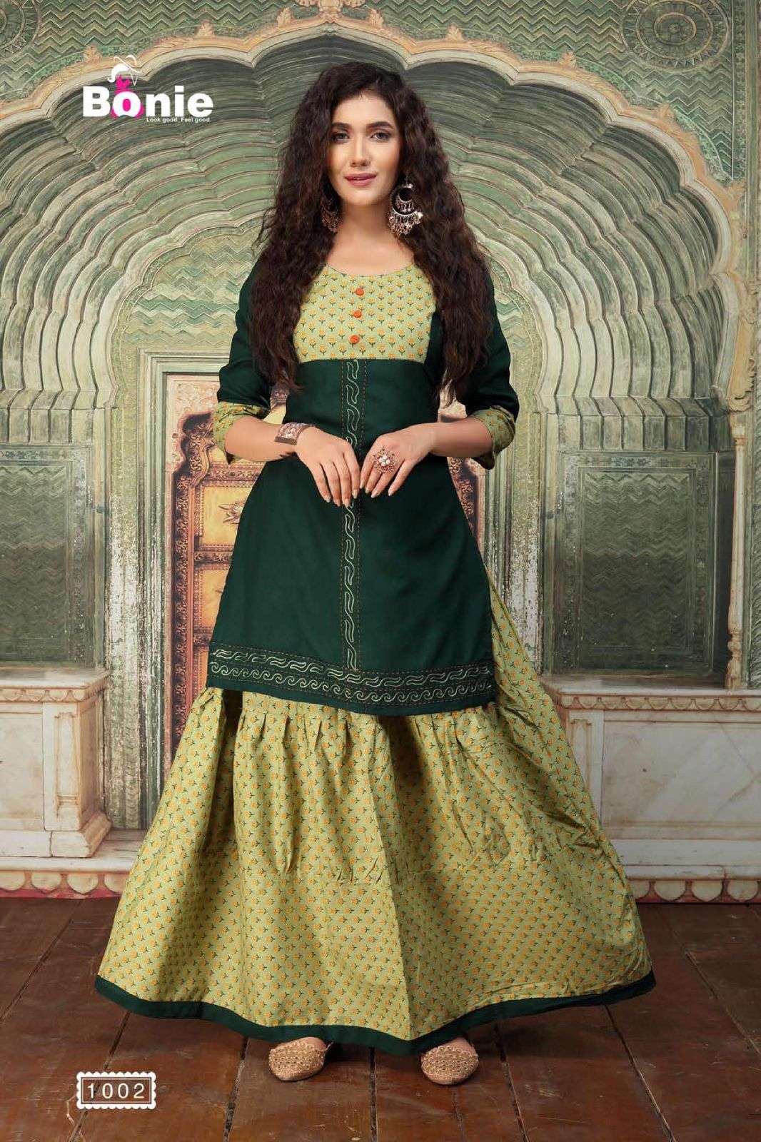 KAJARI BY BONIE 1001 TO 1006 SERIES DESIGNER STYLISH FANCY COLORFUL BEAUTIFUL PARTY WEAR & ETHNIC WEAR COLLECTION RAYON WITH WORK KURTIS WITH SKIRT AT WHOLESALE PRICE