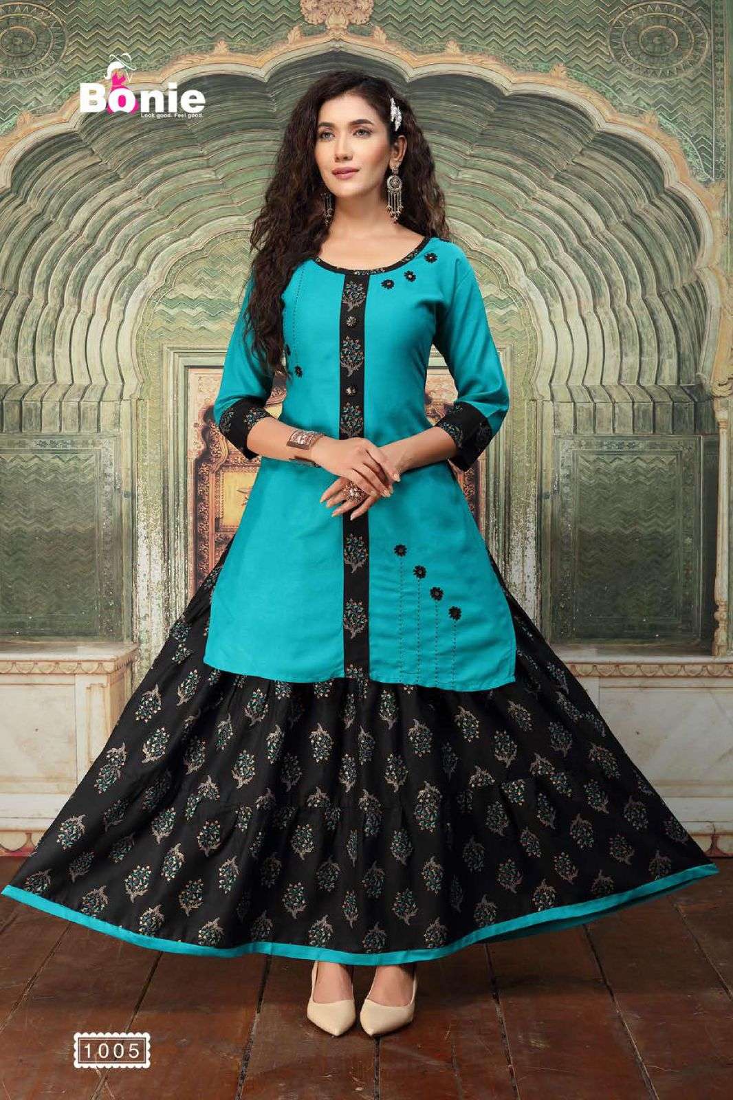 KAJARI BY BONIE 1001 TO 1006 SERIES DESIGNER STYLISH FANCY COLORFUL BEAUTIFUL PARTY WEAR & ETHNIC WEAR COLLECTION RAYON WITH WORK KURTIS WITH SKIRT AT WHOLESALE PRICE